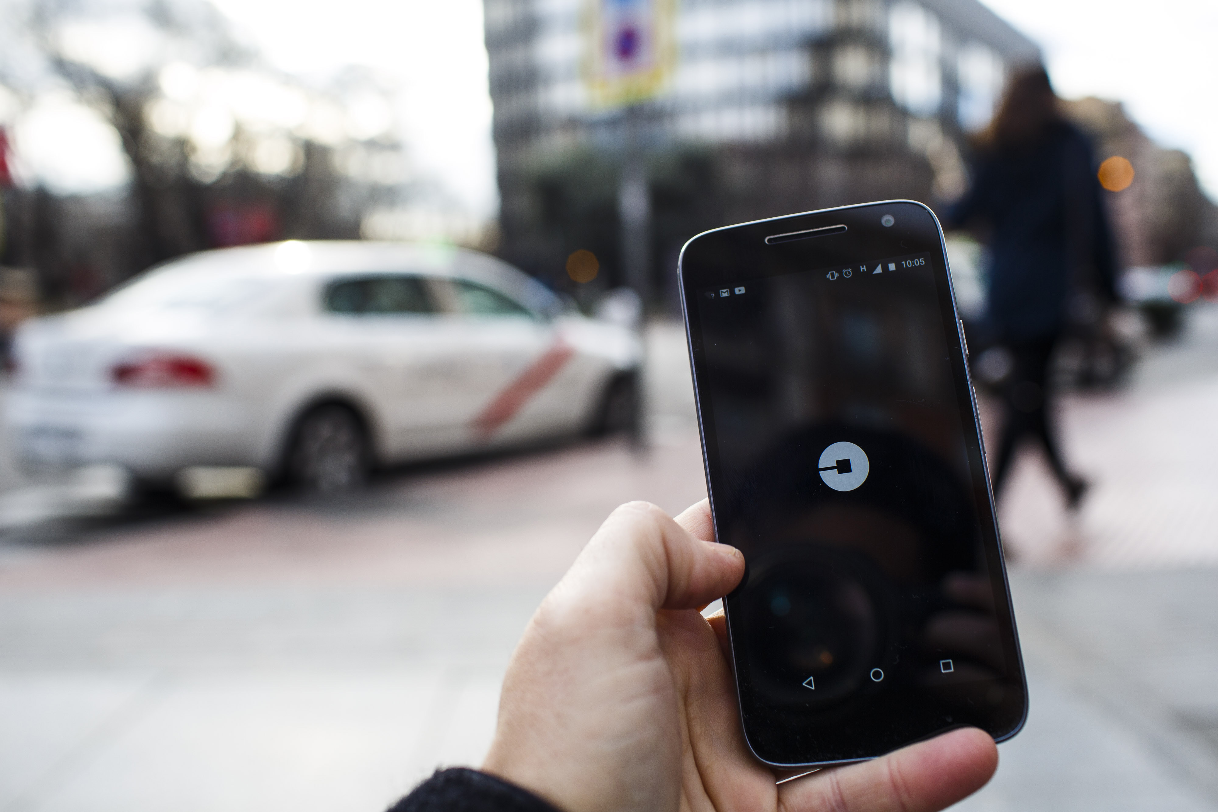 The Uber Technologies Inc. ride-hailing service smartphone app sits on a smartphone display. (Bloomberg&mdash;Bloomberg via Getty Images)