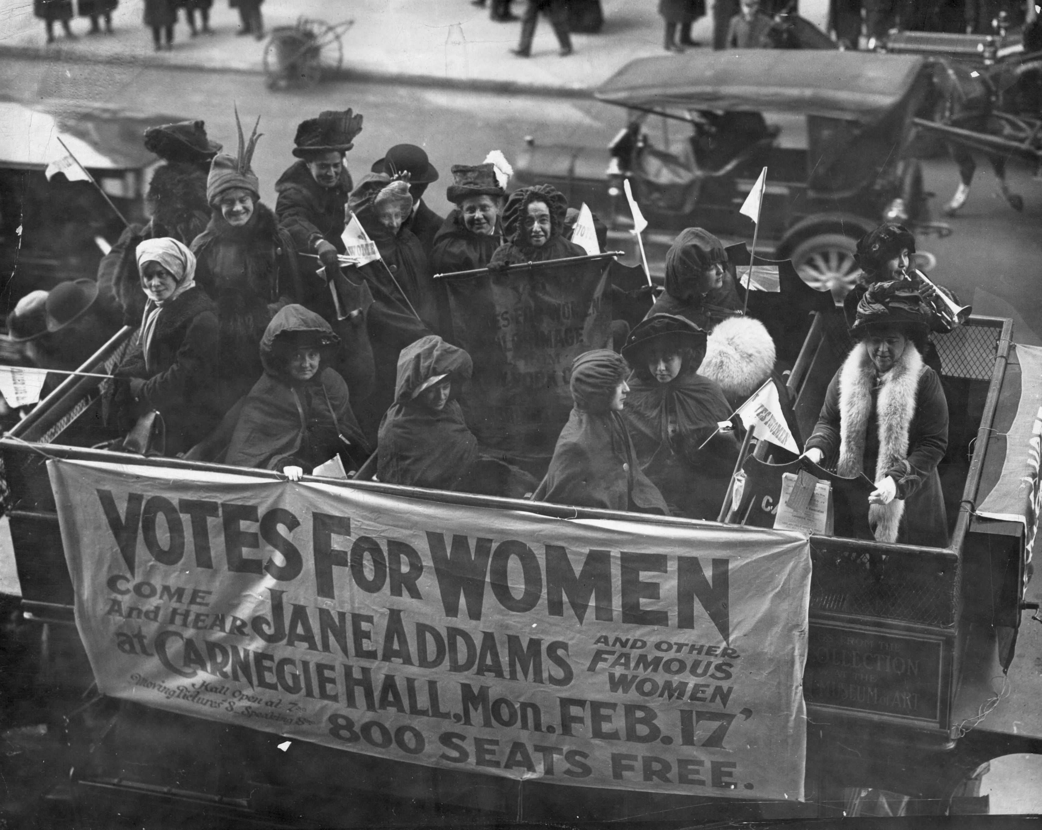 9th February 1913:  A banner advertising a talk on the Women's Suffrage Movement by Jane Addams and others at Carnegie Hall in New York.  (Photo by Paul Thompson/Topical Press Agency/Getty Images) (Paul Thompson&mdash;Getty Images)