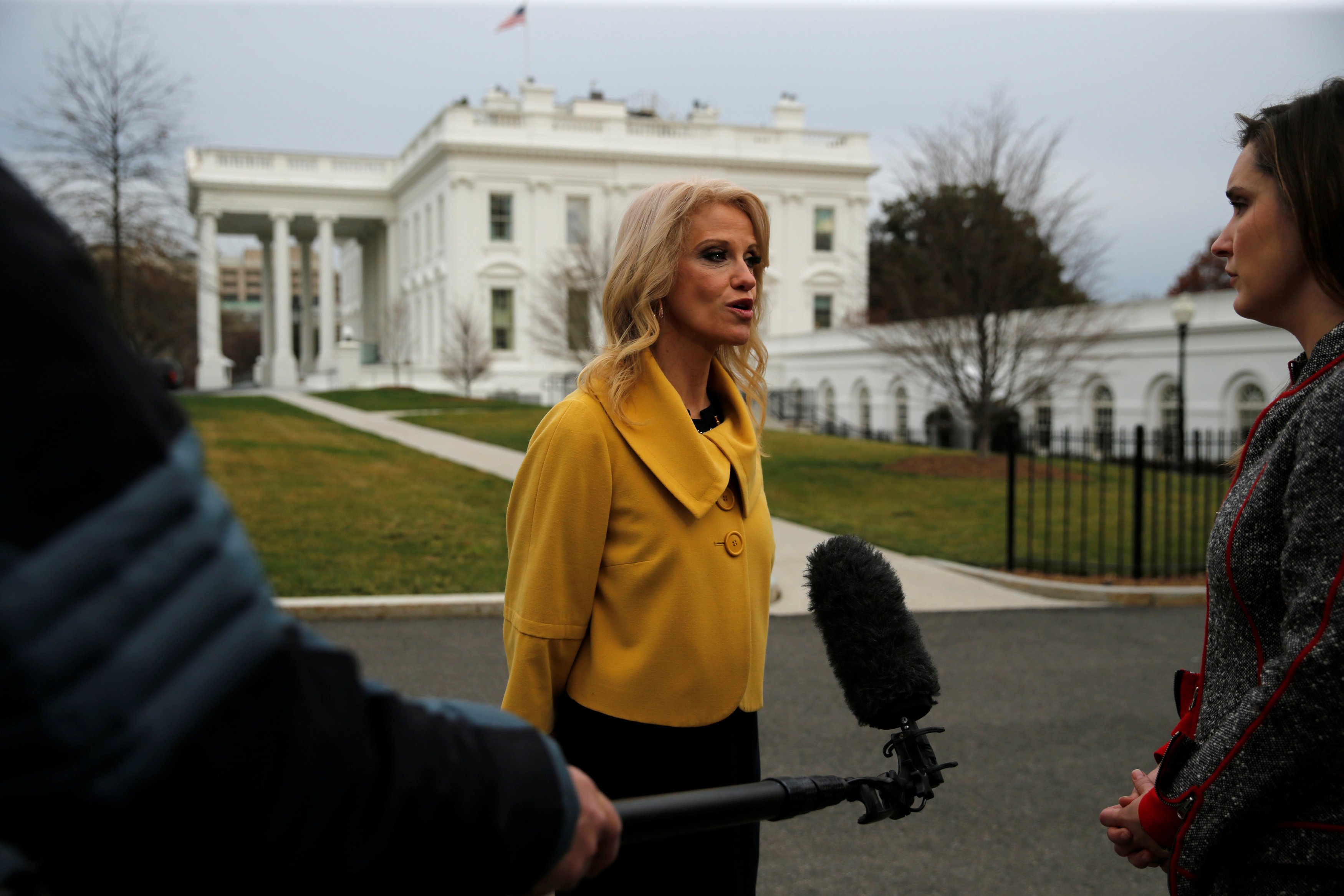 Conway delivers a television interview outside the West Wing of the White House in Washington