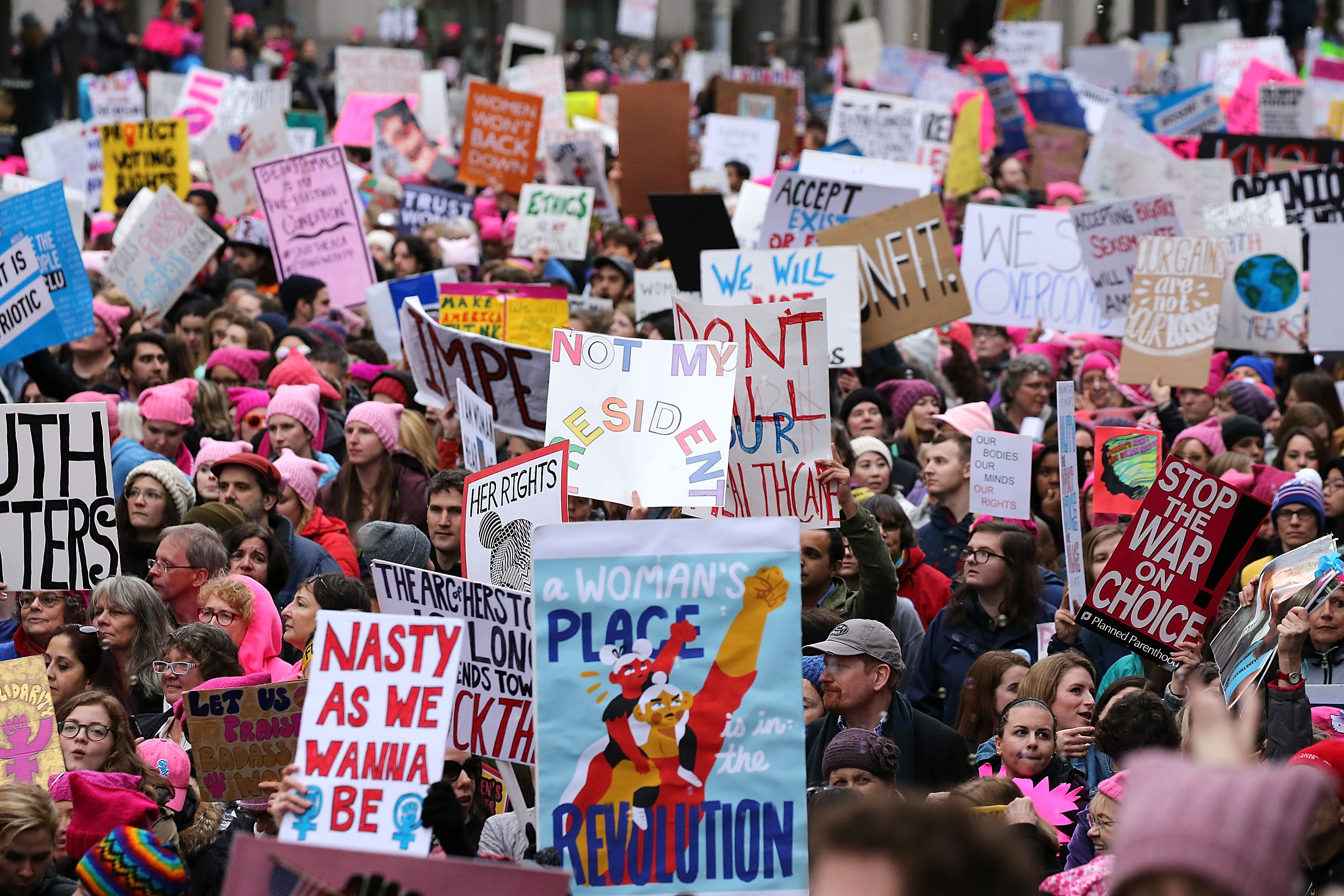 WASHINGTON, DC - JANUARY 21:  Protesters march on Pennsylvania Avenue during the Women's March on Washington on January 21, 2017 in Washington, DC.  (Photo by Paul Morigi/WireImage) (Paul Morigi&mdash;WireImage)