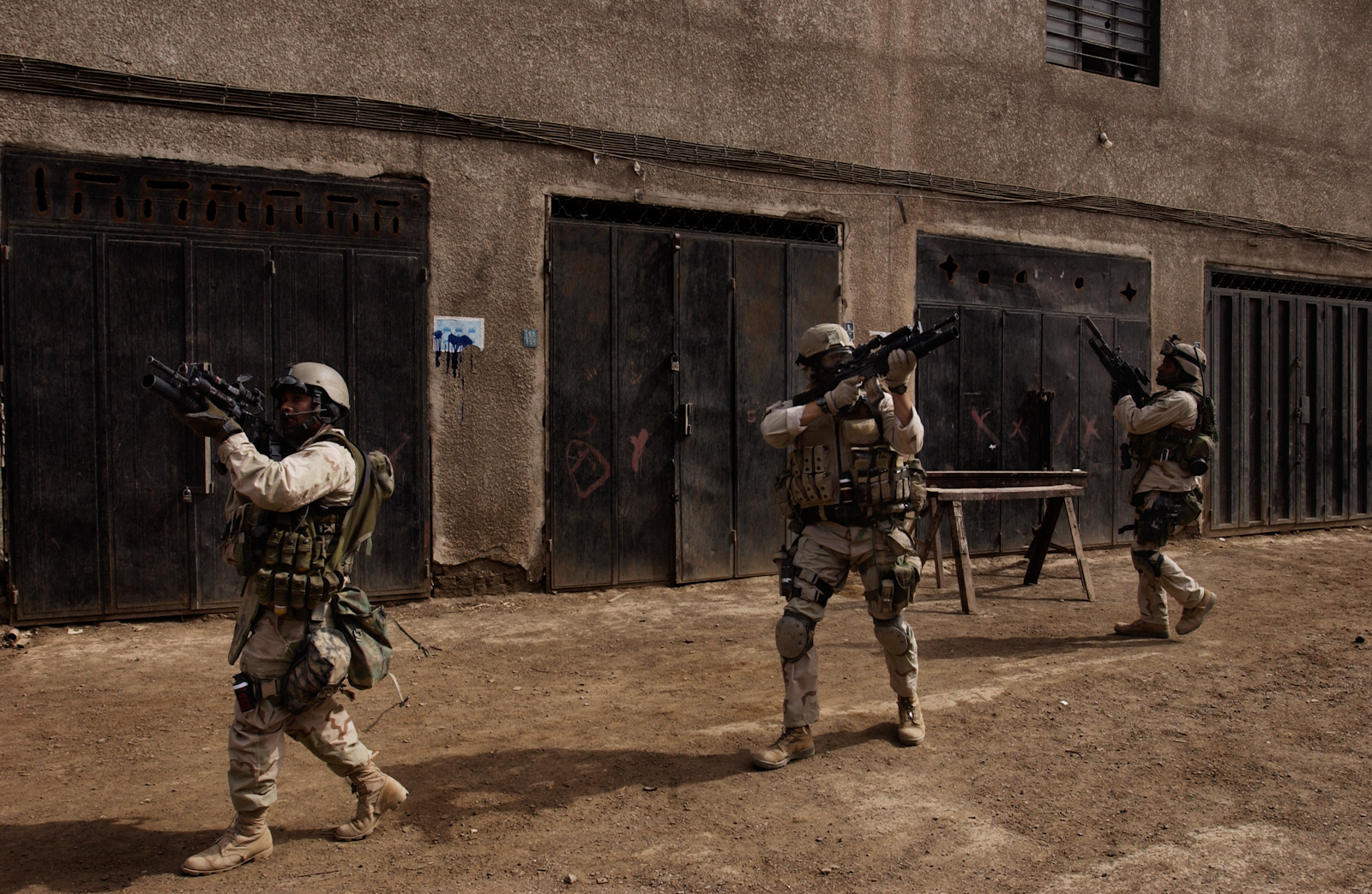 Soldiers search for militants who were targeting U.S. forces in Baghdad, Iraq, April 12, 2003.