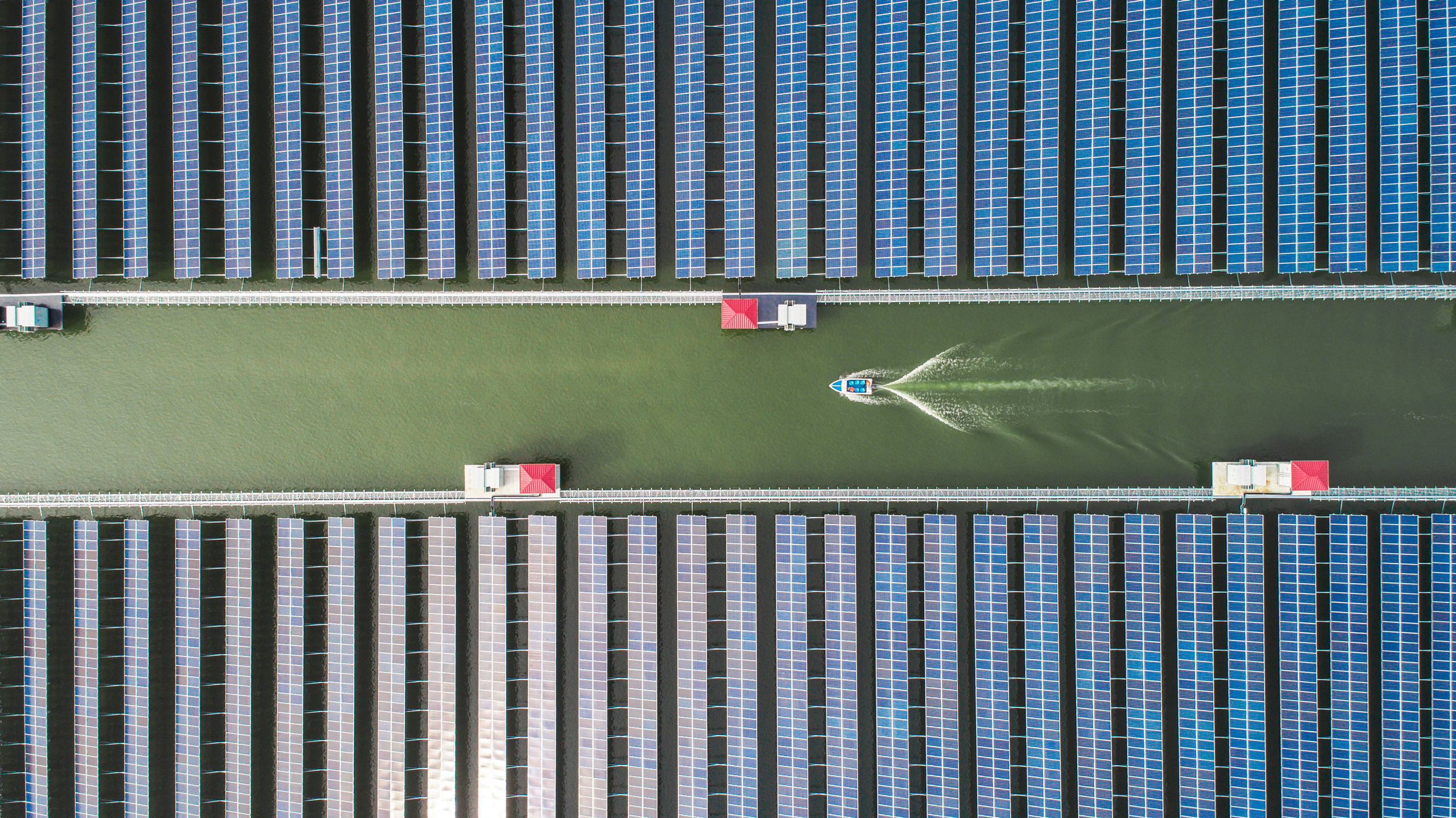 Aerial view of the solar power plant over a fish pond in Cixi on January 10, 2017 in Ningbo, Zhejiang Province of China. The plant is expected to generate electricity with an annual average of about 220 million kWh. (Chai Zheng—Getty Images)