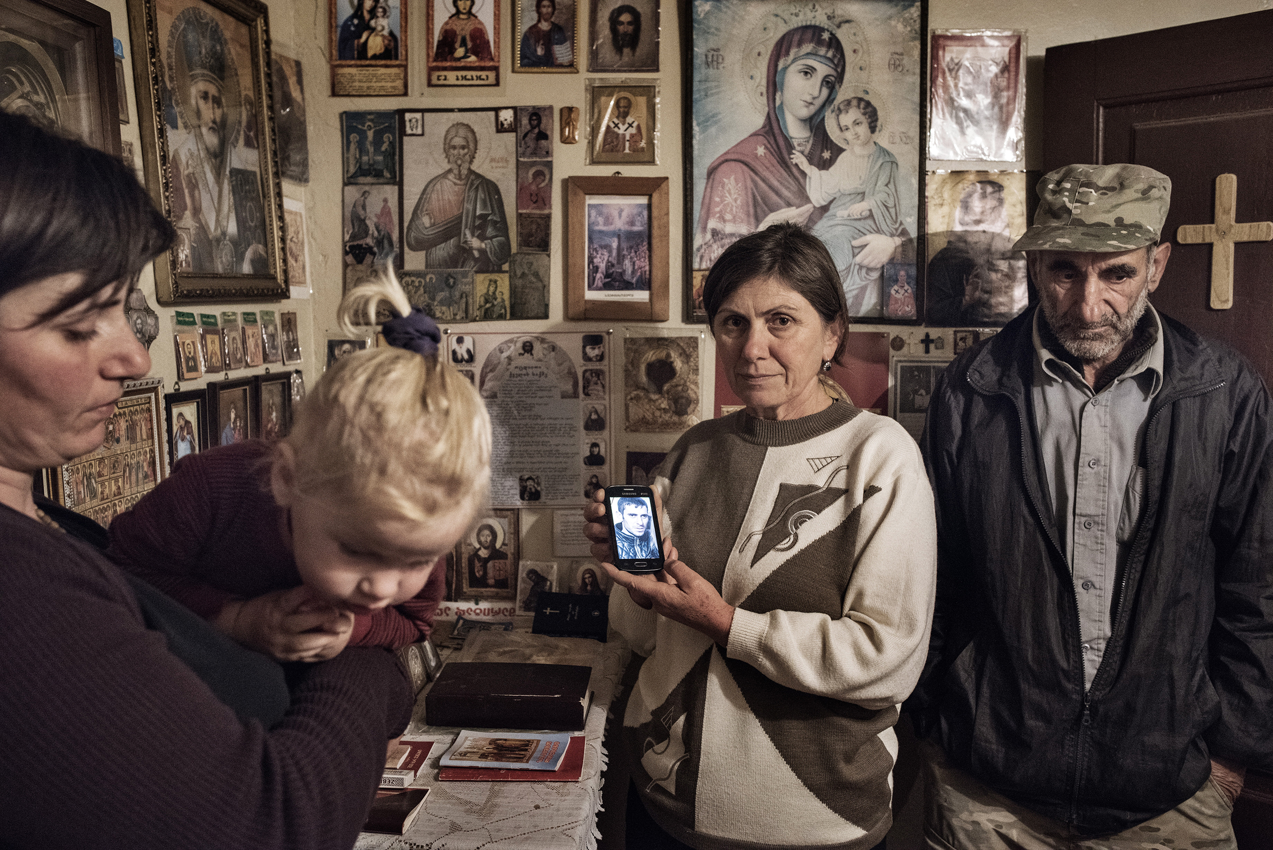Tamila Chaduneli holds a picture of her son Amiran, who was caught attempting to sell highly radioactive uranium in Georgia (Yuri Kozyrev—Noor for TIME)