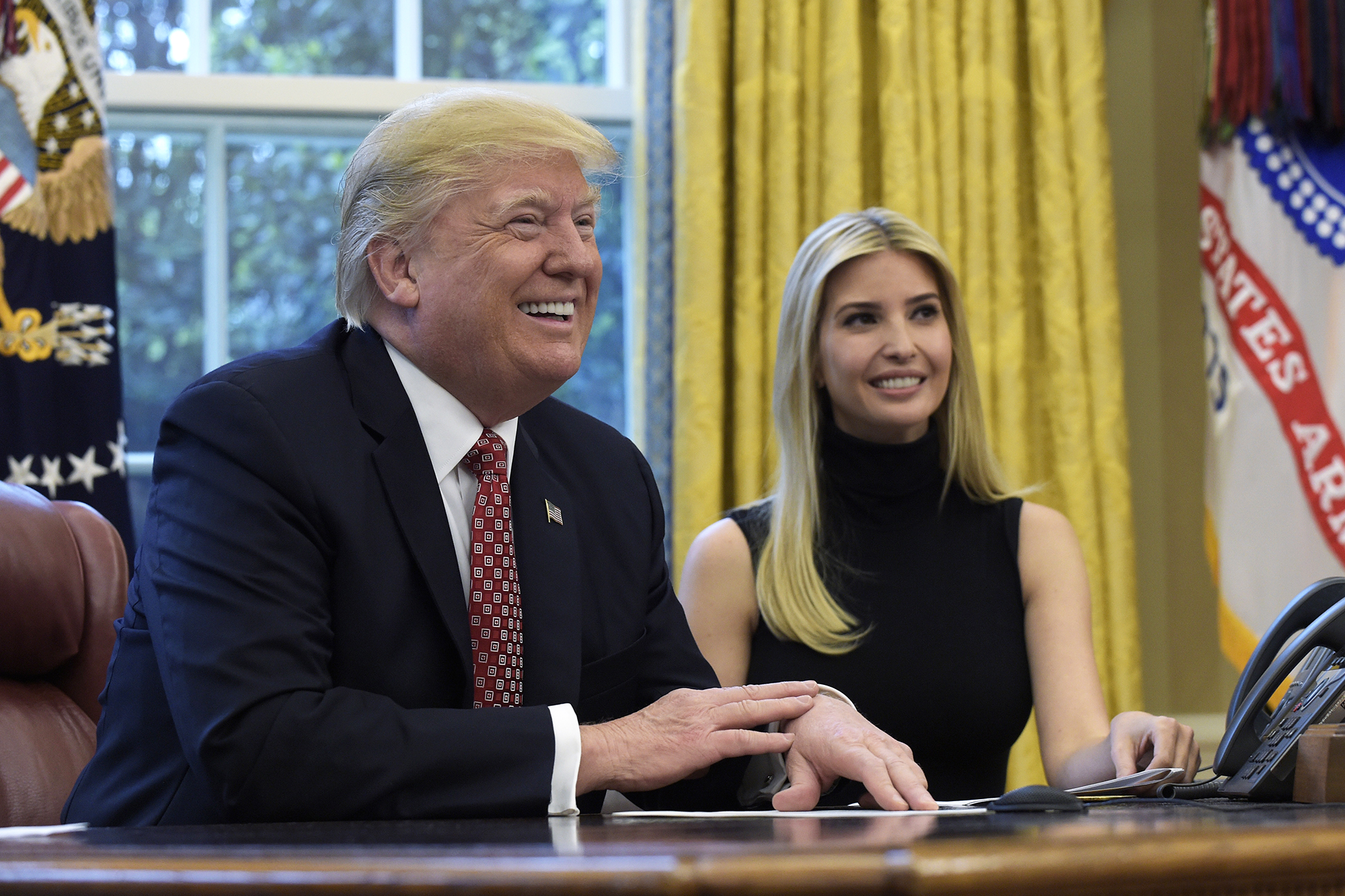 Donald Trump, accompanied by his daughter Ivanka Trump, talk via video conference with International Space Station Commander Peggy Whitson in Washington, D.C., on April 24, 2017. (Susan Walsh—AP)