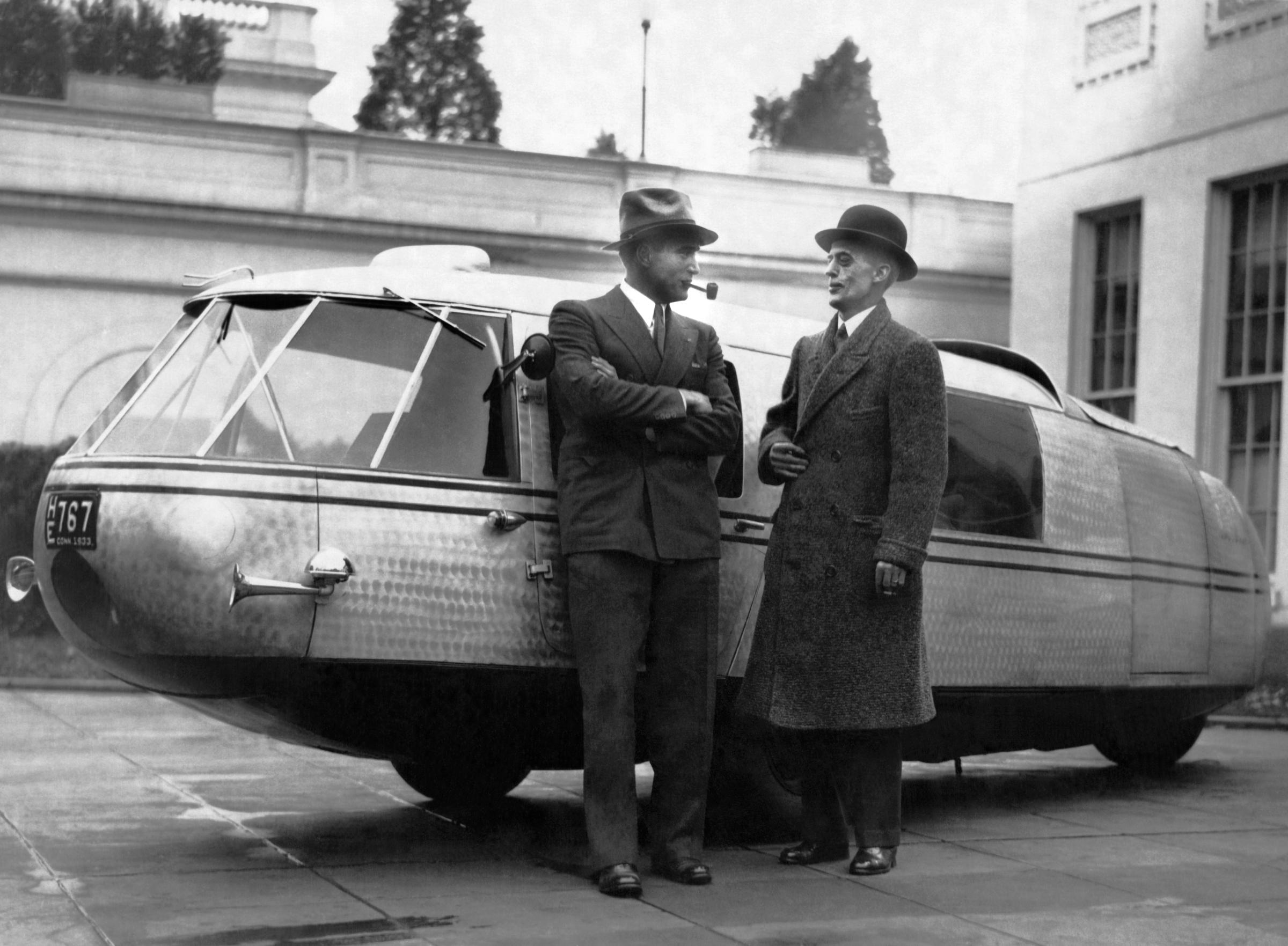 Captain Al Williams, noted speed flyer and driver, and Marvin McIntyre, Secretary to President Roosevelt, standing by the Dymaxion concept car designed by Buckminster Fuller, Washington DC, November 13, 1933. (Photo by Underwood Archives/Getty Images)