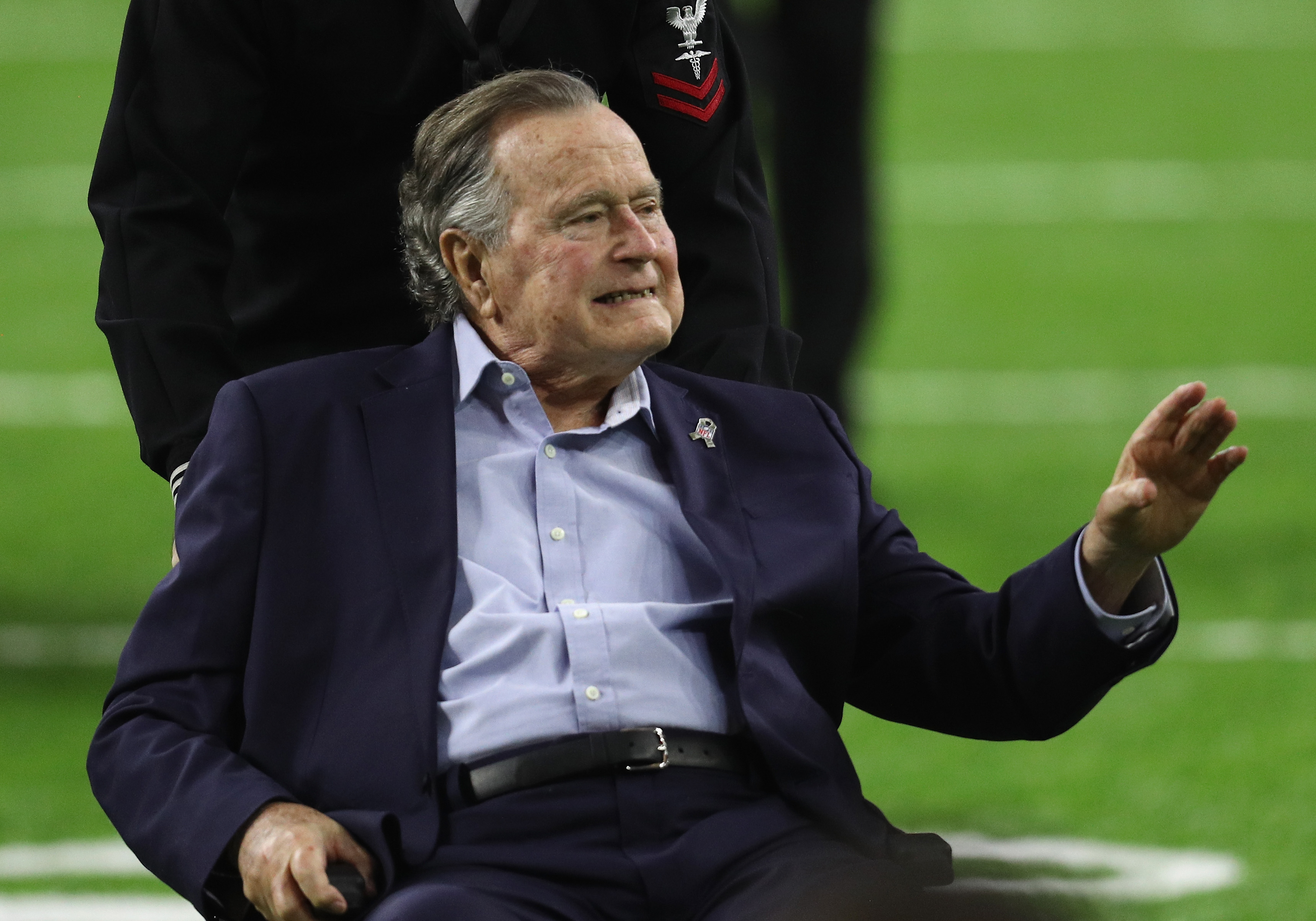 President George H.W. Bush arrives for the coin toss prior to Super Bowl 51 between the Atlanta Falcons and the New England Patriots at NRG Stadium on Feb. 5, 2017 in Houston, Texas. (Patrick Smith/Getty Images)