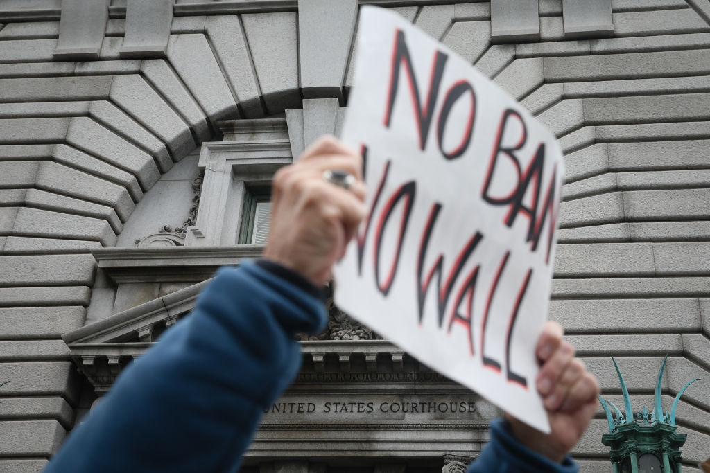 Opponents of President  Trump's travel ban order protest outside a federal appeals court Feb. 7, 2016 in San Francisco, California. (Elijah Nouvelage—Getty Images)