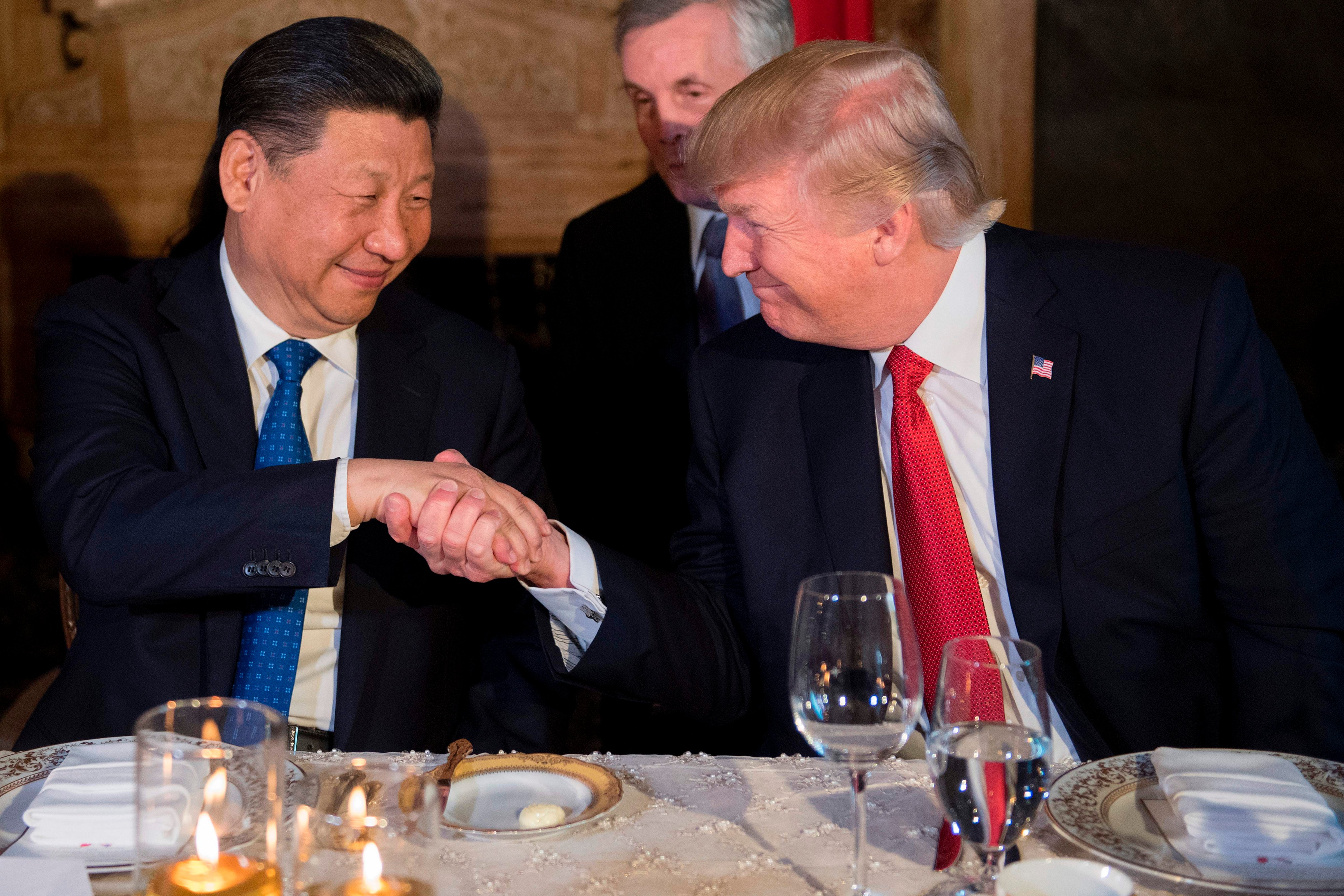 President Trump and Chinese President Xi Jinping at the Mar-a-Lago estate in West Palm Beach, Florida, on April 6, 2017. (Jim Watson—AFP/Getty Images)