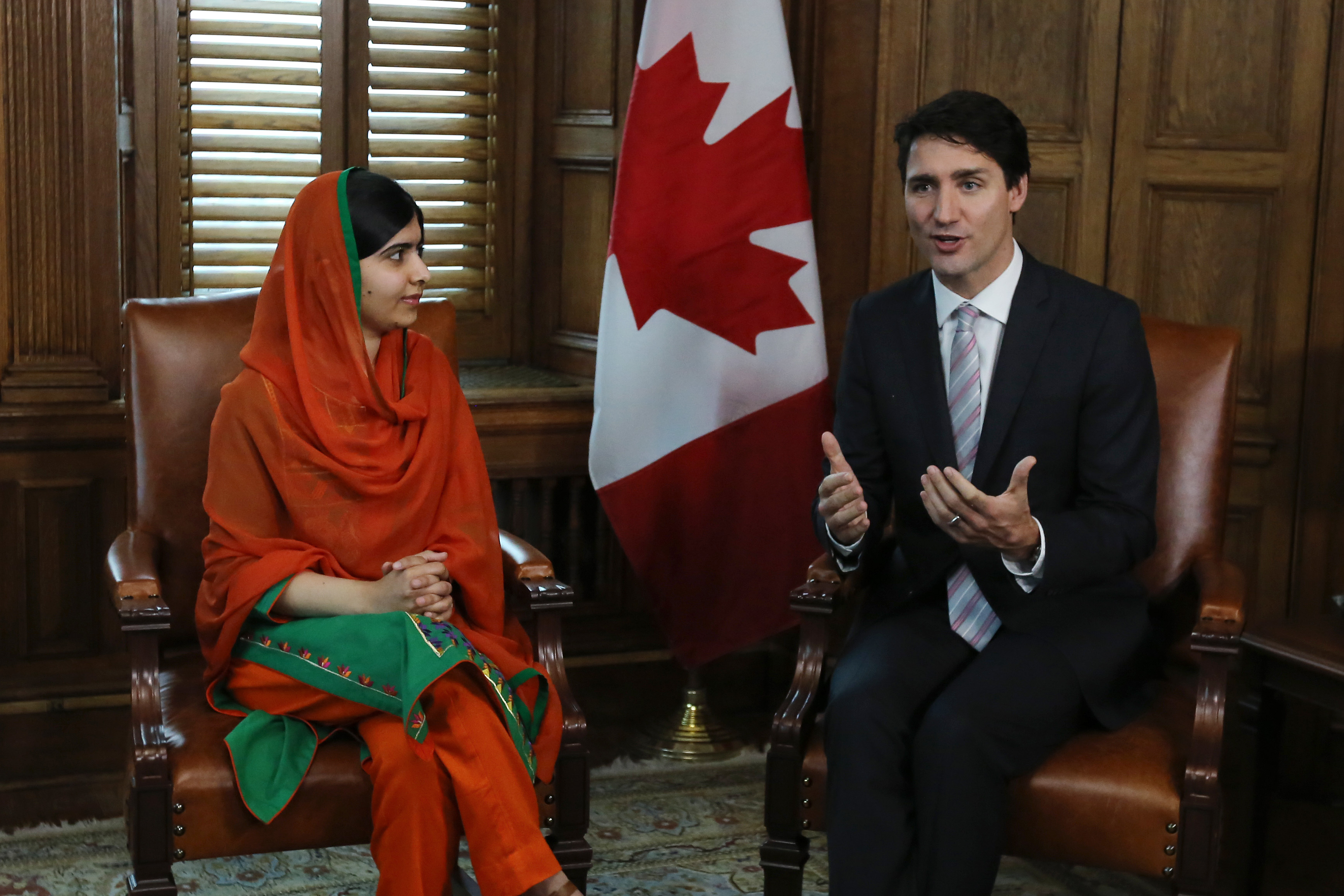 Malala Yousafzai speaks with Canadian Prime Minister Justin Trudeau in Trudeau's office on Parliament Hill in Ottawa, Ontario, April 12, 2017. (LARS HAGBERG—AFP/Getty Images)