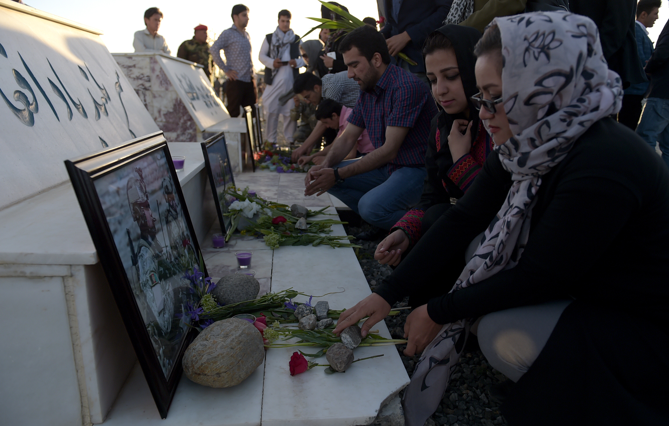 Afghans pay tribute to the victims of a Taliban attack on an army base on the Wazir Akbar Khan hilltop in Kabul on April 23, 2017. (Wakil Kohsar—AFP/Getty Images)