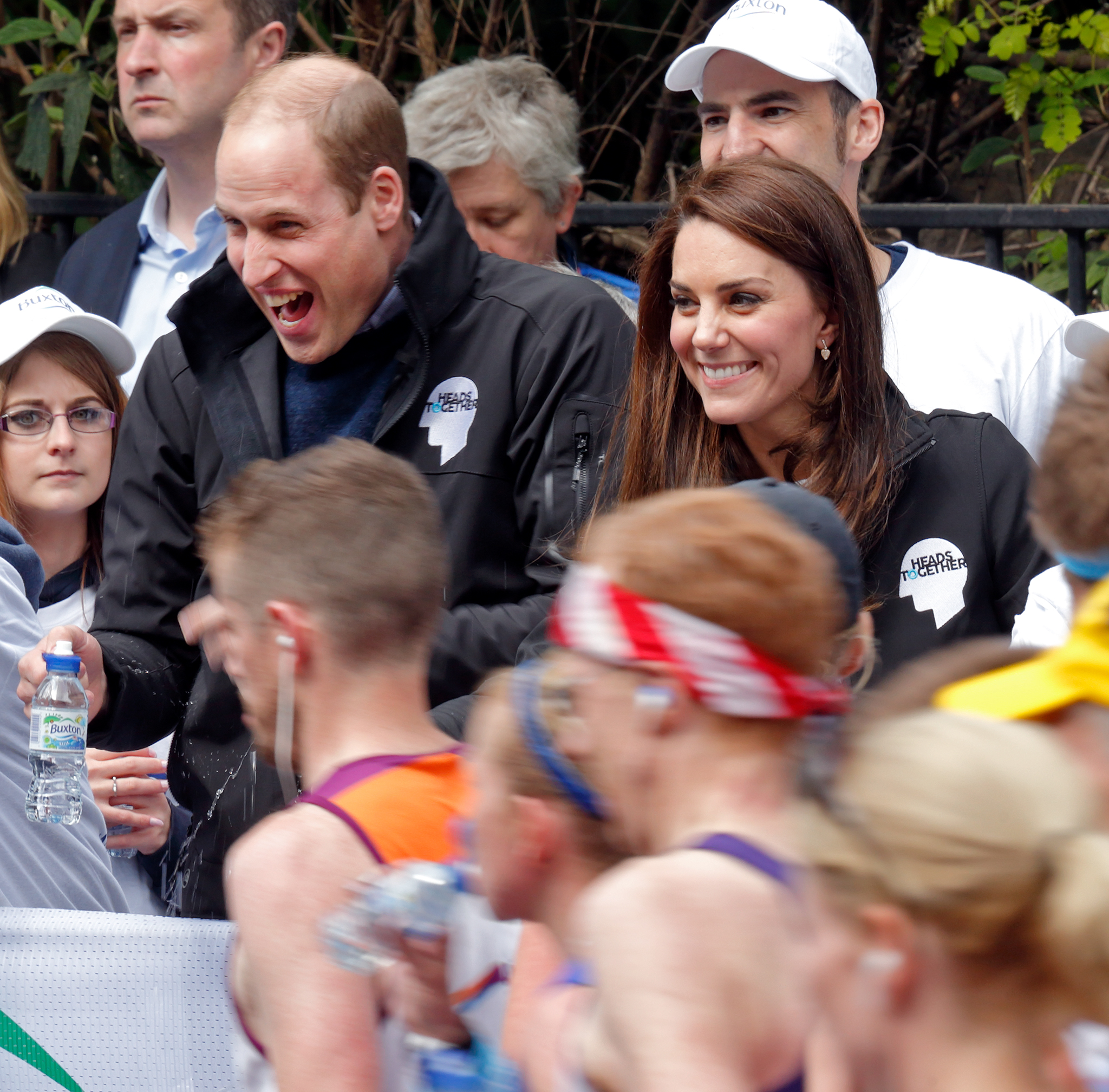 LONDON, UNITED KINGDOM - APRIL 23: (EMBARGOED FOR PUBLICATION IN UK NEWSPAPERS UNTIL 48 HOURS AFTER CREATE DATE AND TIME) Prince William, Duke of Cambridge is squirted with water as he &amp; Catherine, Duchess of Cambridge hand out water to runners taking part in the 2017 Virgin Money London Marathon on April 23, 2017 in London, England. The Heads Together mental heath campaign, spearheaded by The Duke &amp; Duchess of Cambridge and Prince Harry, is the marathon's 2017 Charity of the Year. (Photo by Max Mumby/Indigo/Getty Images) (Max Mumby—Getty Images)