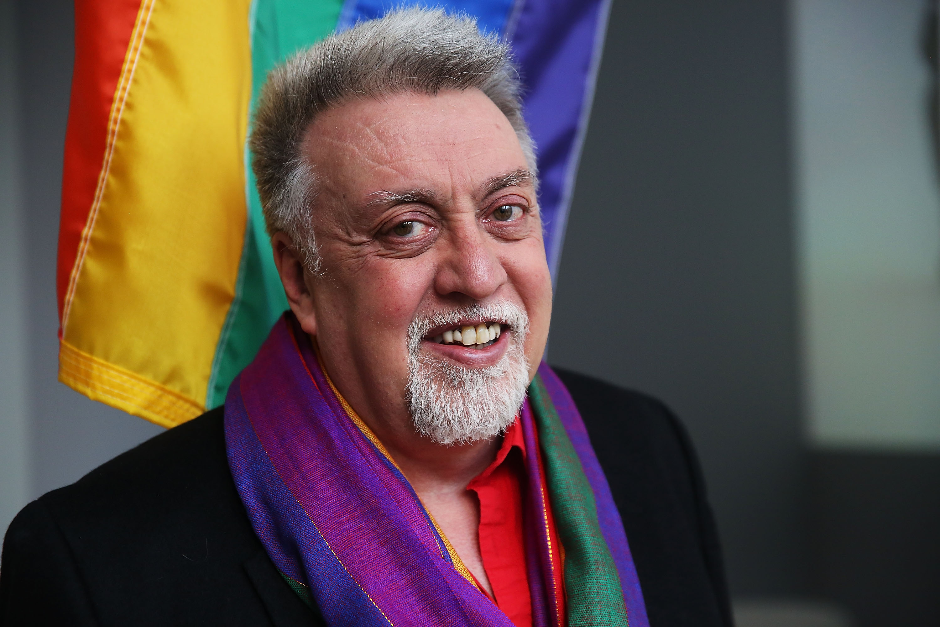 NEW YORK, NY - JANUARY 07:  Rainbow Flag Creator Gilbert Baker poses at the Museum of Modern Art (MoMA) on January 7, 2016 in New York City. MoMa announced in June 2015 its acquisition of the iconic Rainbow Flag into the design collection. Baker, an openly gay artist and civil rights activist, designed the Rainbow Flag in 1978. The flag has since become a prominent symbol to the gay community around the world. (Spencer Platt —Getty Images)