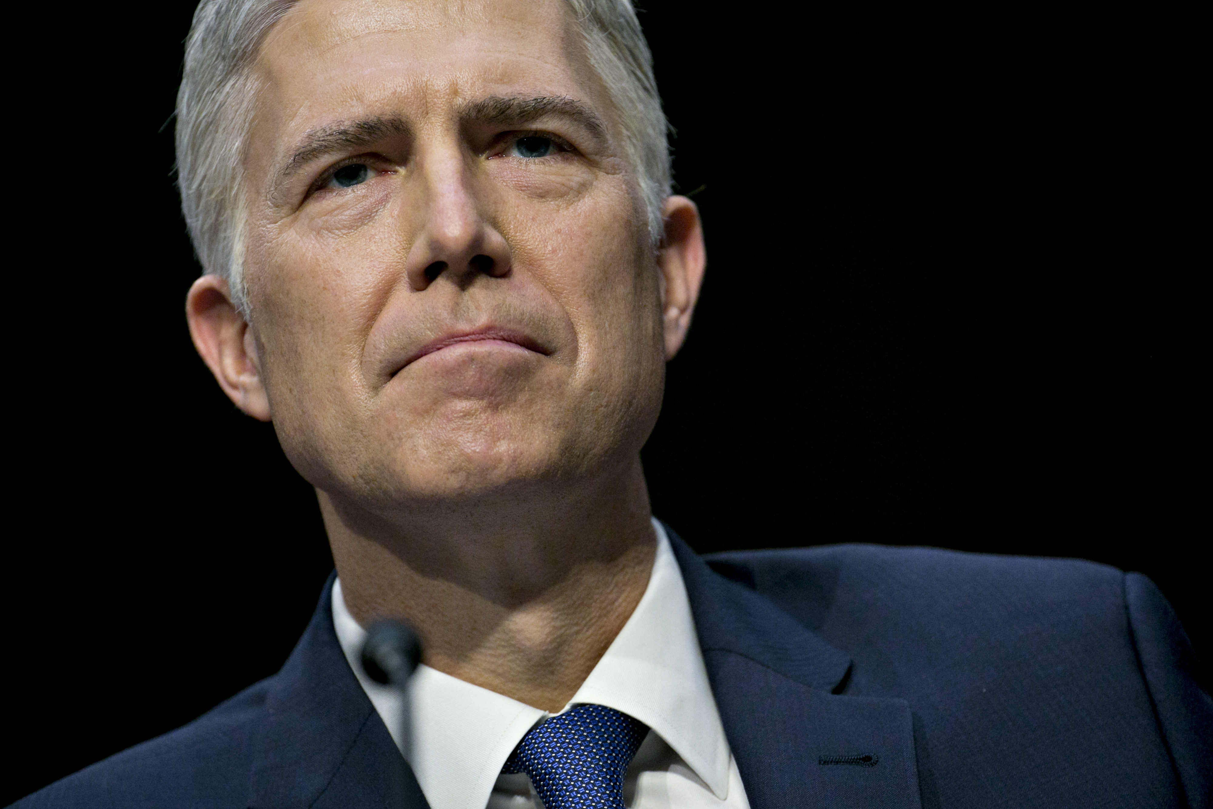 Neil Gorsuch listens during a Senate Judiciary Committee confirmation hearing in Washington, on March 20, 2017. (Andrew Harrer—Bloomberg/Getty Images)