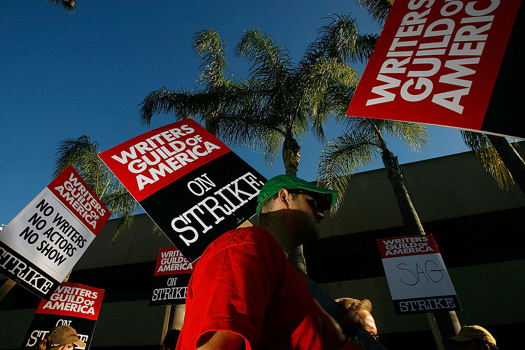 Writers Guild of America members and supporters picket in front of NBC studios as hope grows that a draft copy of a proposed deal with Hollywood studios being completed today could lead to an end to the three-month old Hollywood writers strike within days, on February 8, 2008 in Burbank, California. (David McNew—Getty Images)