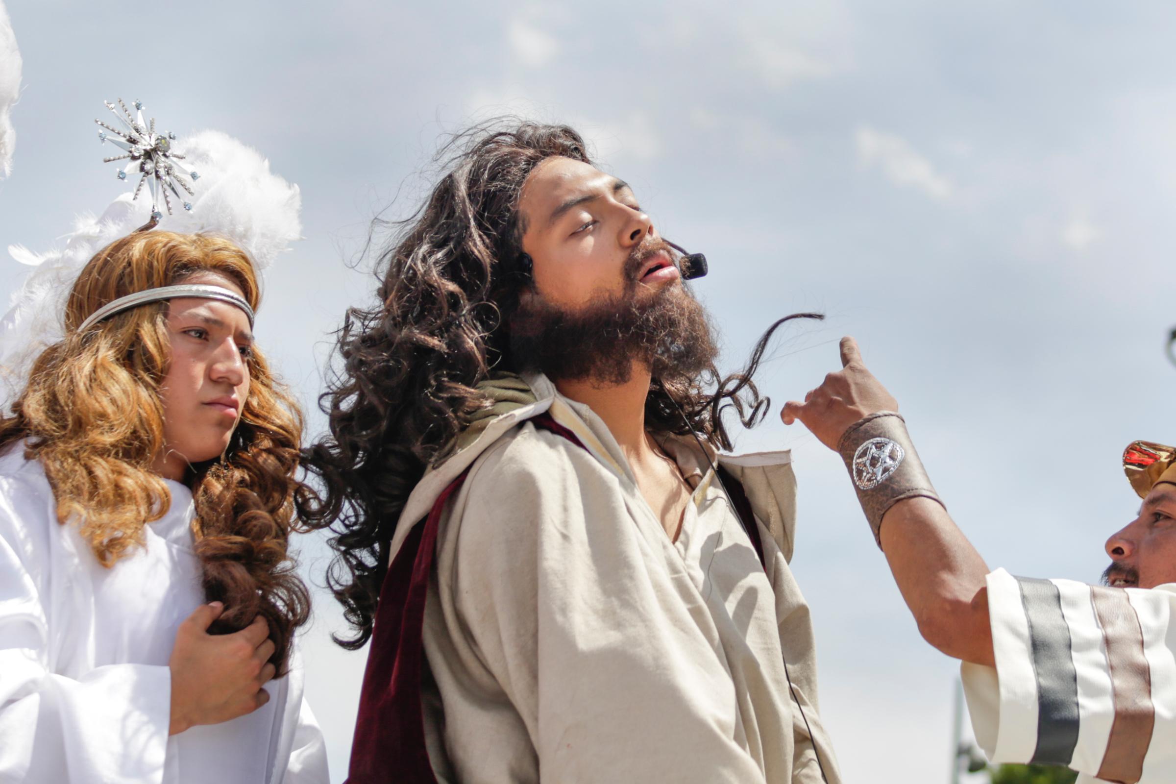 A non- professional actor playing the role of Christ is photographed with other two in the roles of ad angel and a Roman soldier during the Crucifixion of Jesus for the Holy Week celebrations in Iztapalapa, Mexico. The actor chosen to play Christ goes through a year of spiritual and physical training before being able to perform. In Mexico many communities stage processions for Good Friday. The Mexico City borough of Iztapalapa holds the largest and most elaborate of these, with up to 5,000 people participating and 150 of these with speaking roles. Its origins date back to a cholera epidemic in the 19th century, which gave rise to a procession to petition relief.