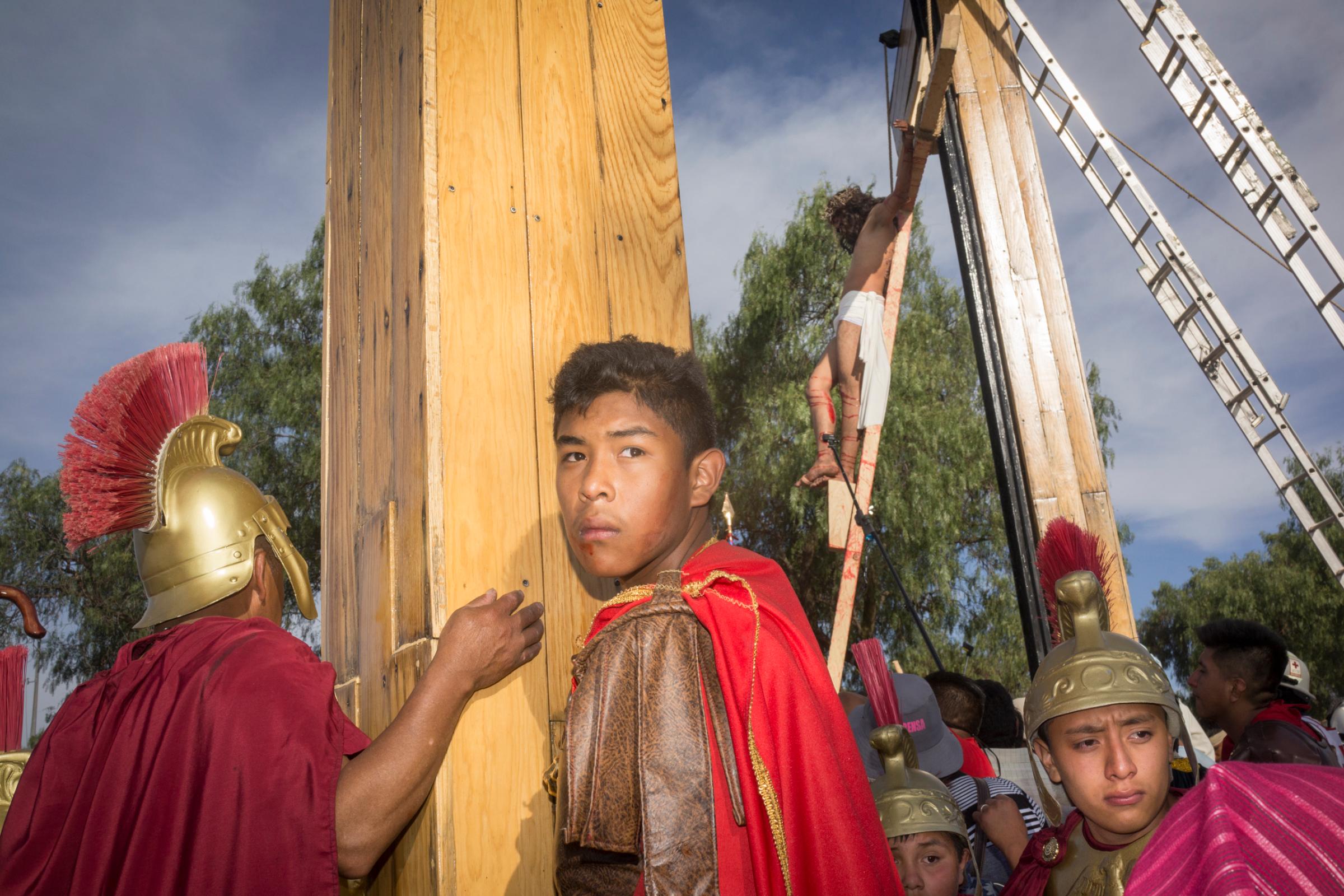 An actor playing the role of a Roman soldier during Holy Week celebrations in Iztapalapa, Mexico.