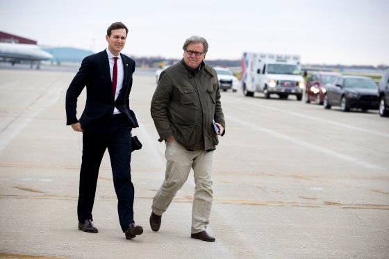 Steve Bannon, right, then a senior strategist for President-elect Donald Trump, and Jared Kushner, Trump's son-in-law, arrive in Indianapolis, for a rally, Dec. 1, 2016.