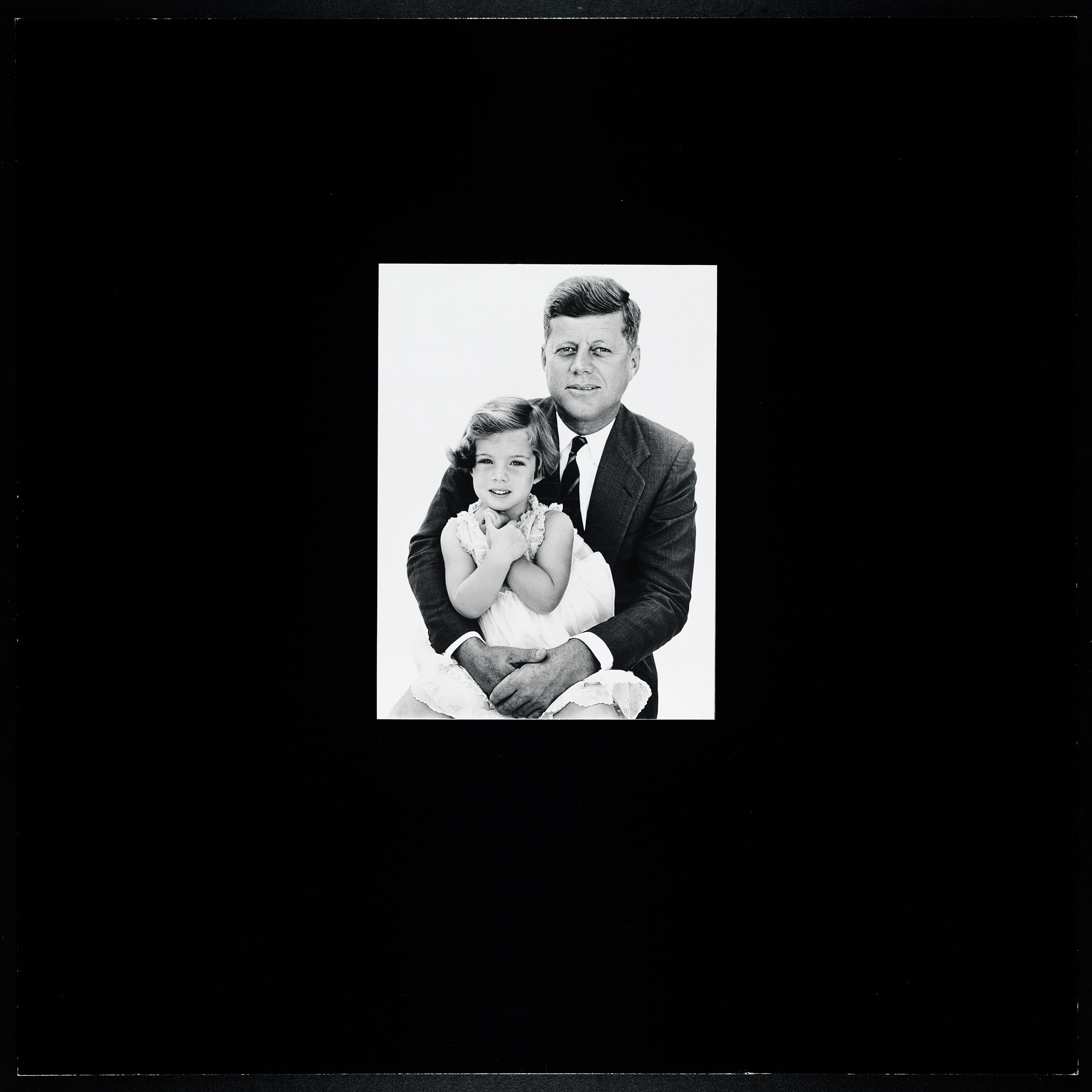 John F. Kennedy and daughter Caroline by Richard Avedon, 1961.