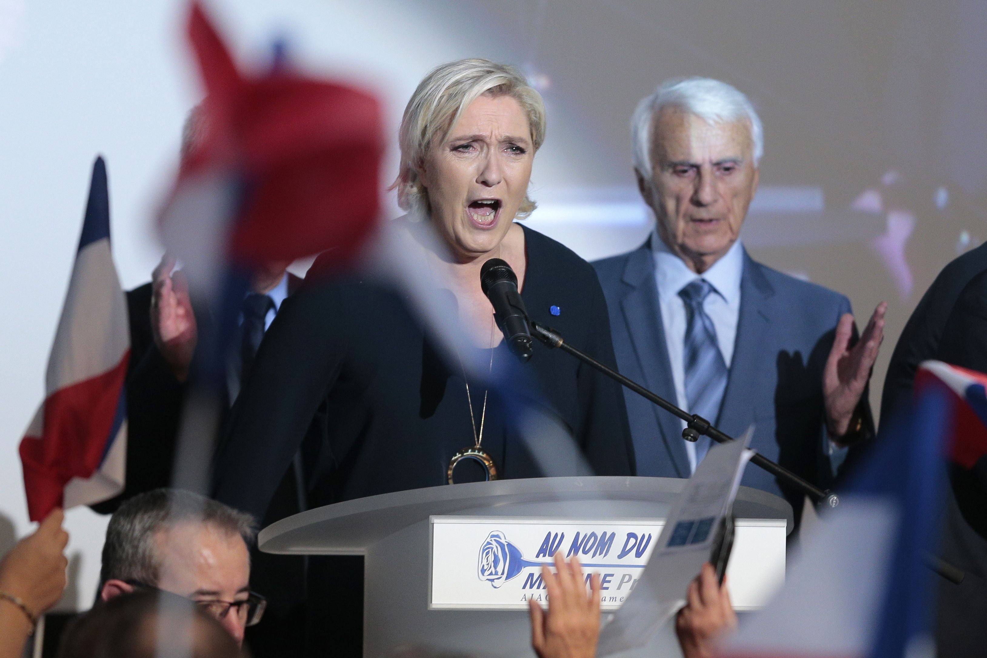 French presidential election candidate for the far-right Front National (FN) party Marine Le Pen delivers a speech during a campaign meeting at the Palais des Congres in Ajaccio on the French Mediterranean island of Corsica, on April 8, 2017. (Pascal Pochard-Casabianca—AFP/Getty Images)