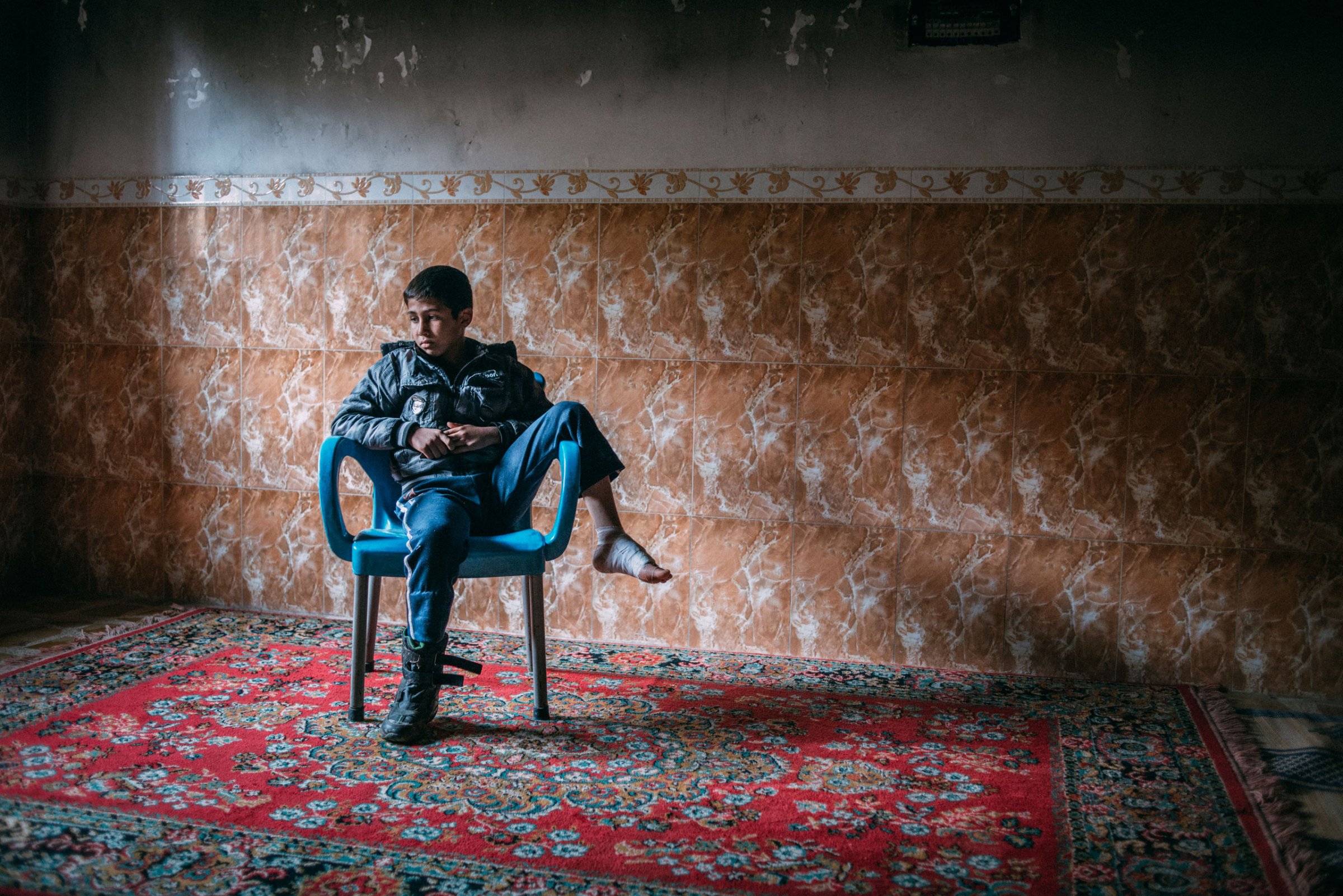 Ali Bashar Ali, 8, lives with his family in his grandfather’s house in the Mosul al-Jadida neighborhood of western Mosul, where Iraqi forces are battling Islamic State militants for control of the city. While fleeing their home, Ali was hit in the foot by a stray bullet. On April 1, 2017, he answered a few questions about his recent days in this war zone. His most recent meal? “Tomato soup and rice. During the battle [the liberation of his neighborhood] we only ate a few meals in three days.” How does he fall asleep at night? “We don’t sleep well. I sleep a little and then wake up, until morning.” His favorite toy? “A boat.” What does he want to be when he grows up? “A doctor.”