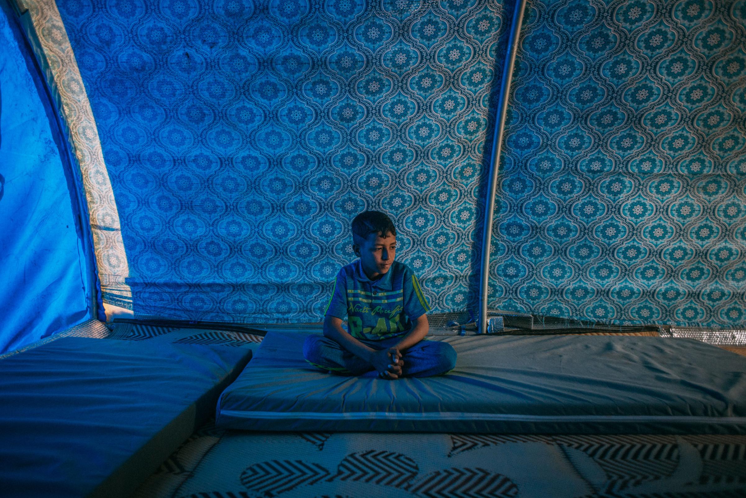 Ayman Mohamed Ahmed lives in the Hamam al-Alil displacement camp south of Mosul. On April 6, 2017, he answered a few questions about his recent days in this war zone. His most recent meal? Rice and beans. What does he think about at night? "I hope ISIS members do not come and blow themselves up in our house." His favorite toy? He doesn't have toys in the camp, but back at home it was a car. What does he want to be when he grows up? A doctor, because that's "the best" and he wants to help people.