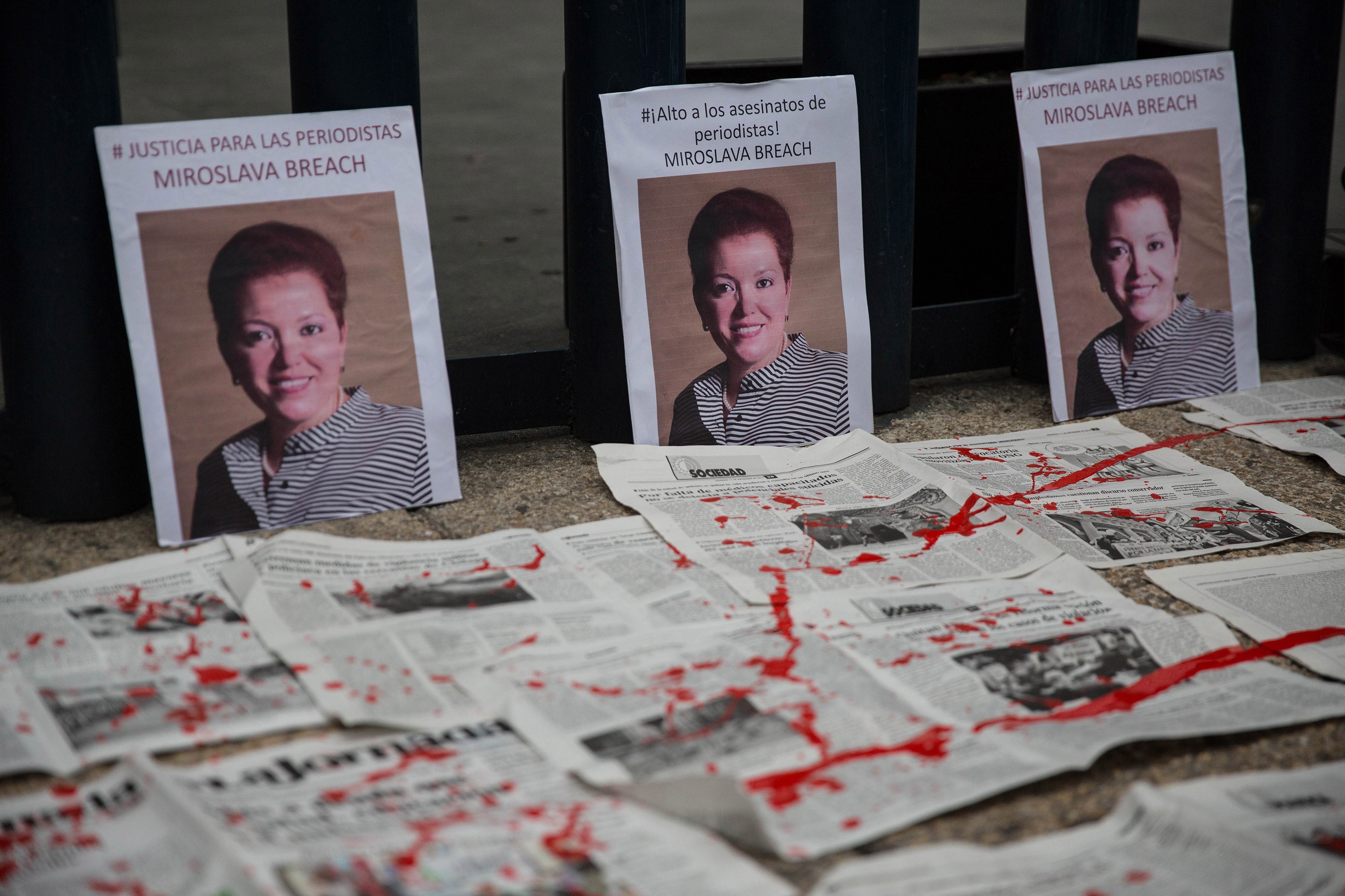 Portraits of Miroslava Breach are seen during a protest against the recent murder of the correspondent journalist for "La Jornada" newspaper, in Mexico City, Mexico on March 25, 2017. The correspondent who was killed in Chihuahua is third Mexican journalist killed in the month of March. (Daniel Cardenas/Anadolu Agency—Getty Images)