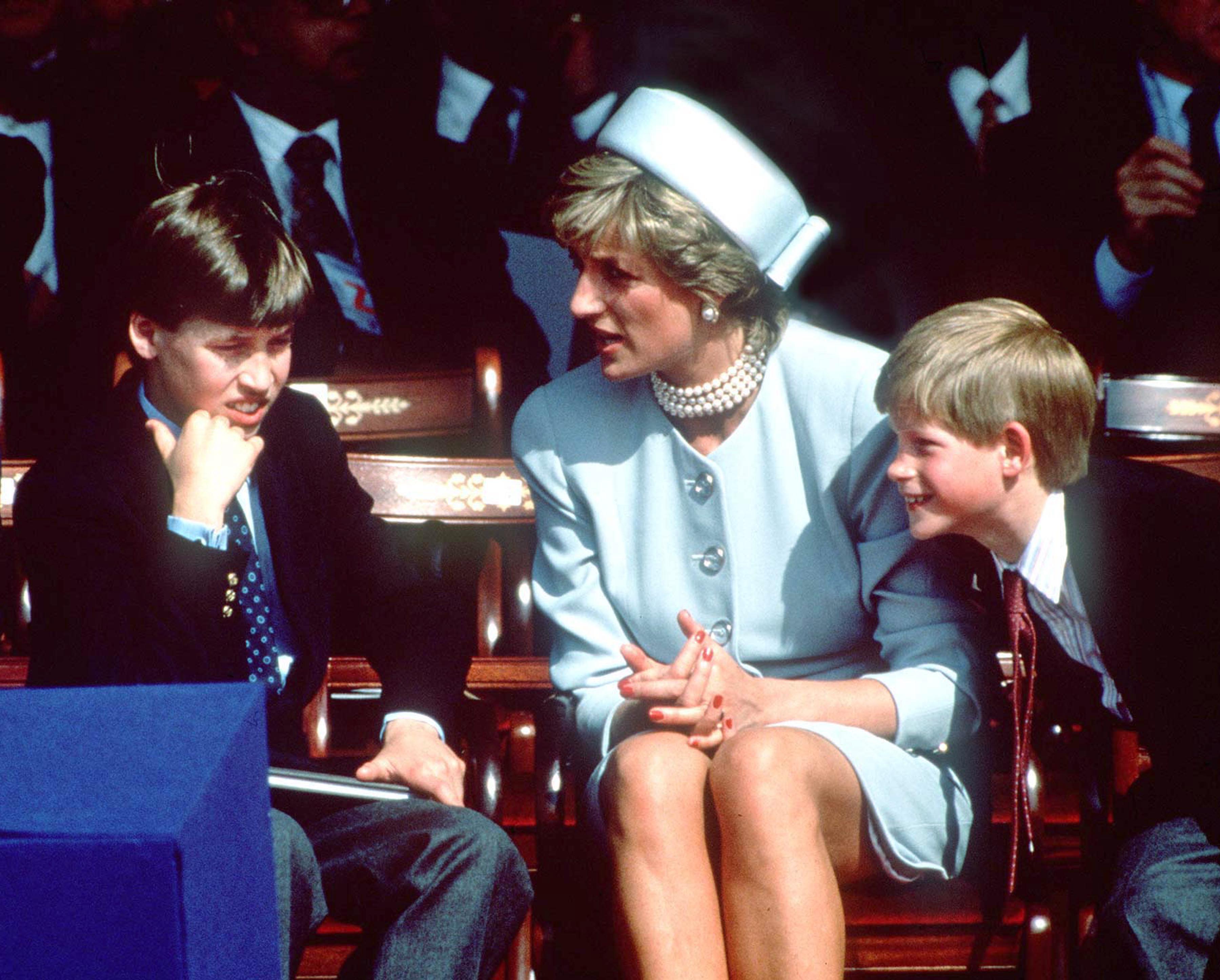Princess Diana (1961 - 1997) with her sons Prince William and Prince Harry at the V.E Day commemorations in Hyde Park, London, May 1995. (Rota/Pool/Getty Images)