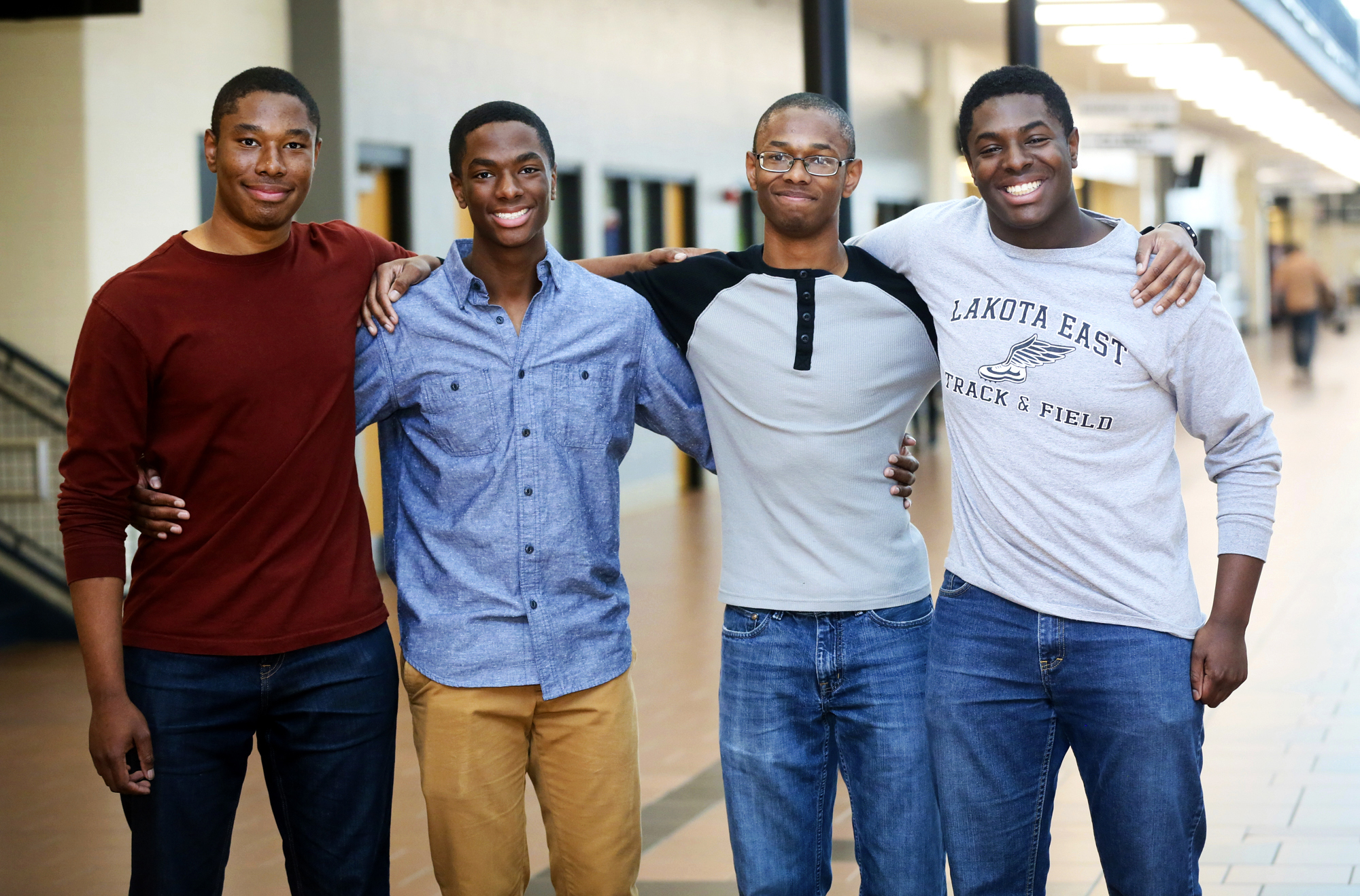 Lakota East seniors and quadruplet brothers from left, Zachary, Aaron, Nigel, and Nick Wade at Lakota East High School in Liberty Township, Ohio, on April 5, 2017. (Greg Lynch—AP)
