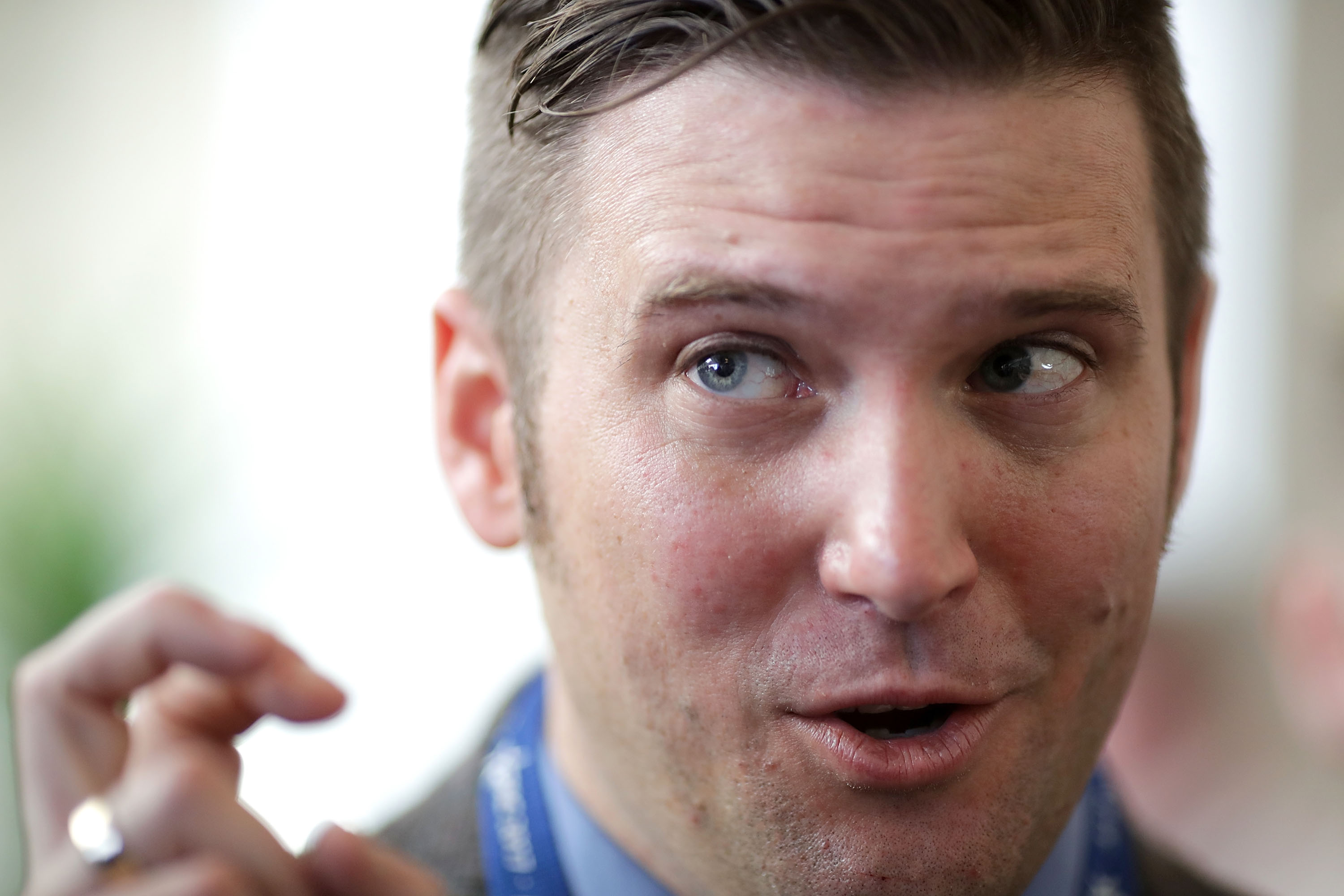 White nationalist Richard Spencer talks with reporters during the first day of the Conservative Political Action Conference at the Gaylord National Resort and Convention Center on Feb. 23, 2017 in National Harbor, Maryland. (Chip Somodevilla/Getty Images)