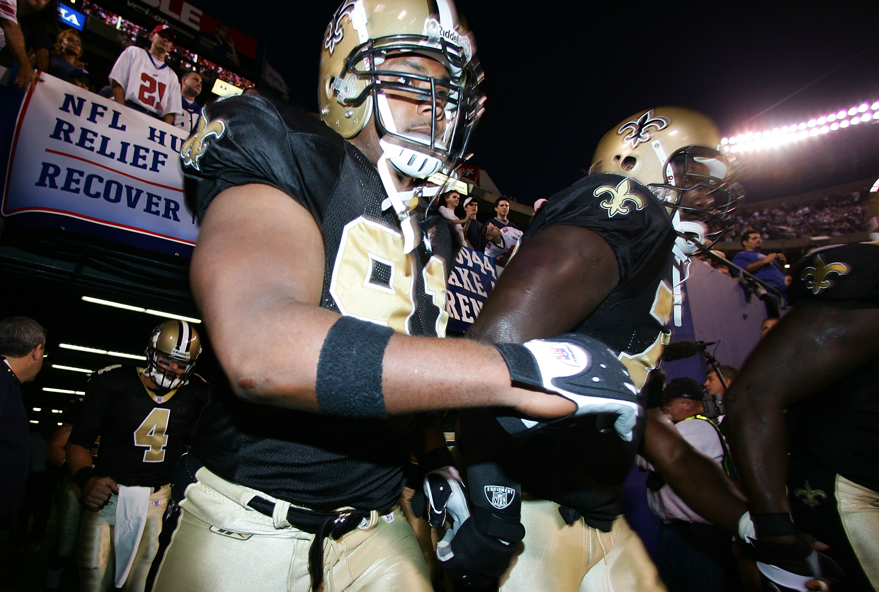 Will Smith and Jammal Brown of the New Orleans Saints take the field before the start of their game against the New York Giants on September 19, 2005 at Giants Stadium in East Rutherford, New Jersey. (Al Bello&mdash;Getty Images)