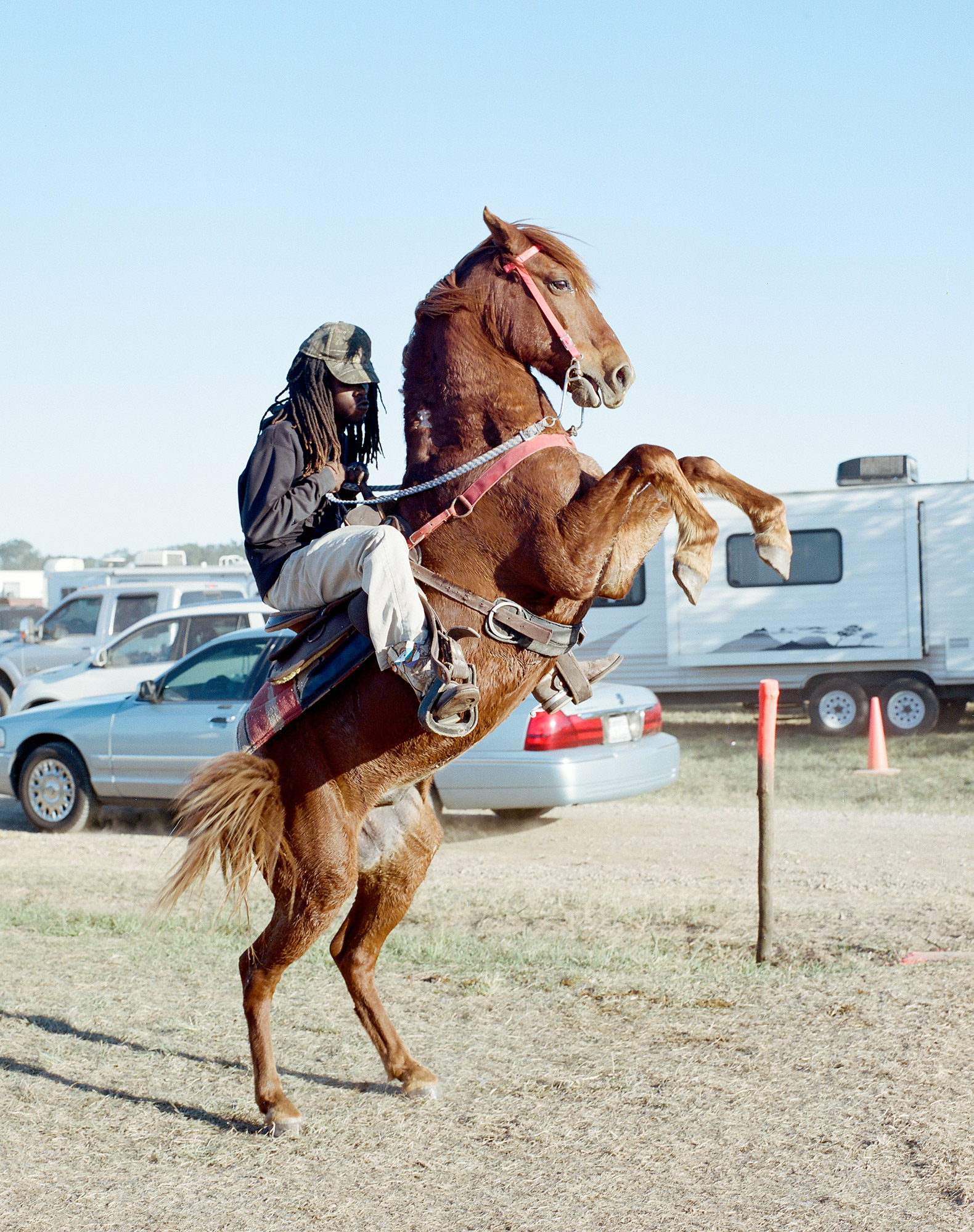 A man doing a trick at a trail ride in Southern Louisiana, 2014.