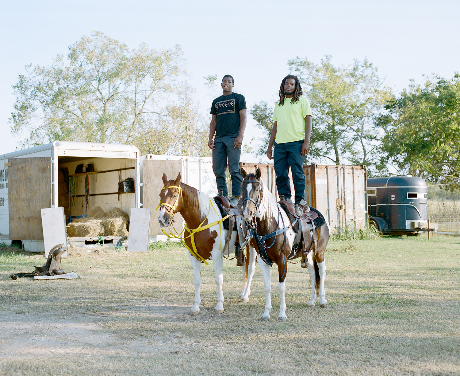Devence and Dwayne balance on their horses. 2014