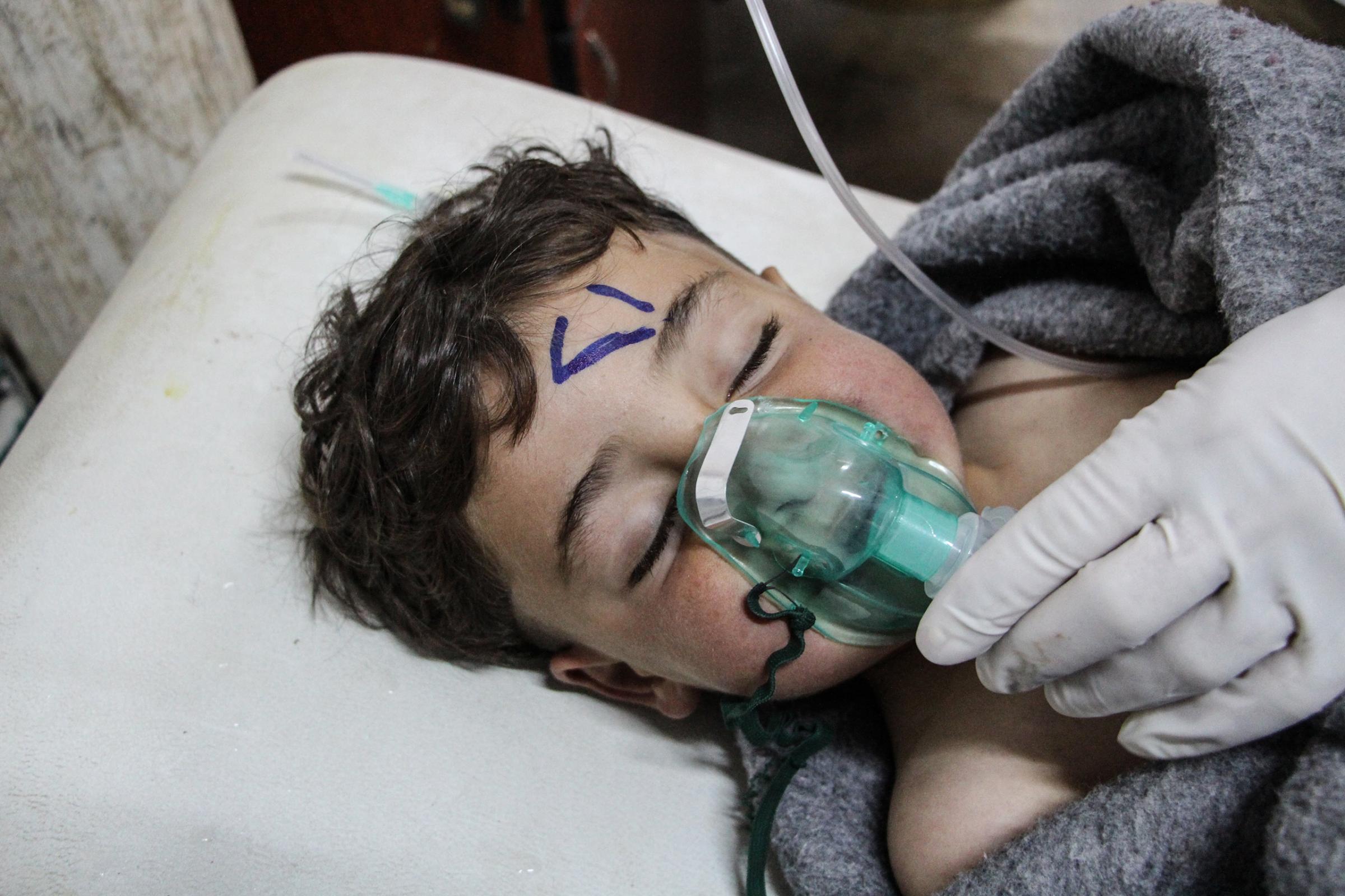 At least 58 killed in suspected gas attack in northern Syria, NGO