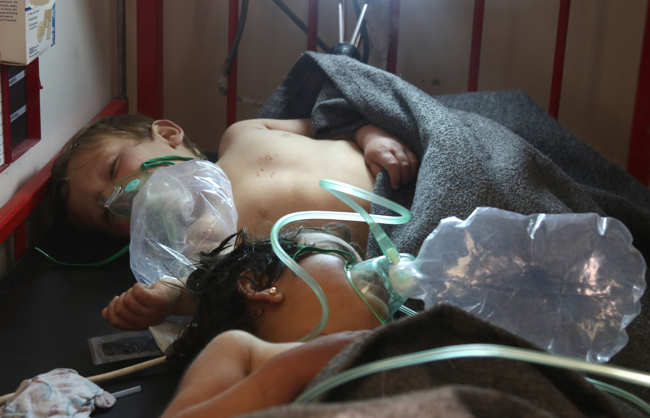 Syrian children receive treatment at a small hospital in the town of Maaret al-Noman following a suspected toxic gas attack in Khan Sheikhun, a nearby rebel-held town in Syrias northwestern Idlib province, on April 4, 2017.