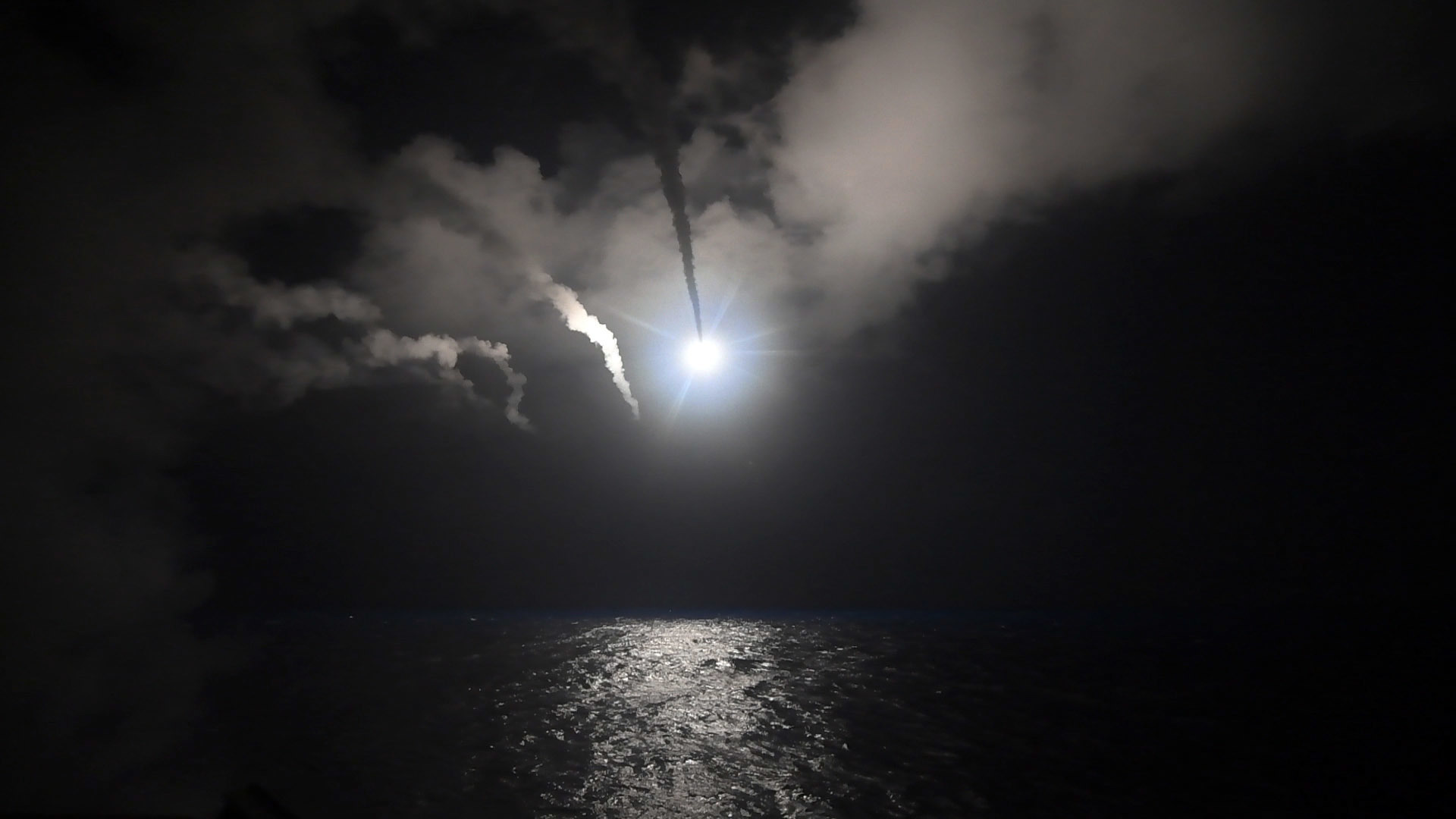 In this image provided by the U.S. Navy, the guided-missile destroyer USS Porter (DDG 78) launches a tomahawk land attack missile in the Mediterranean Sea, April 7, 2017.