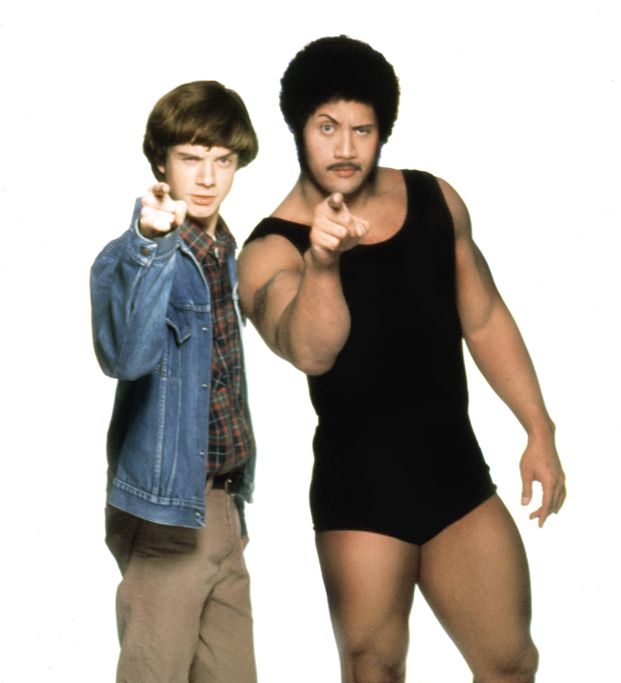 Topher Grace and Johnson in a promotional image for the  That Wrestling Show  episode of That '70s Show in 1999.
