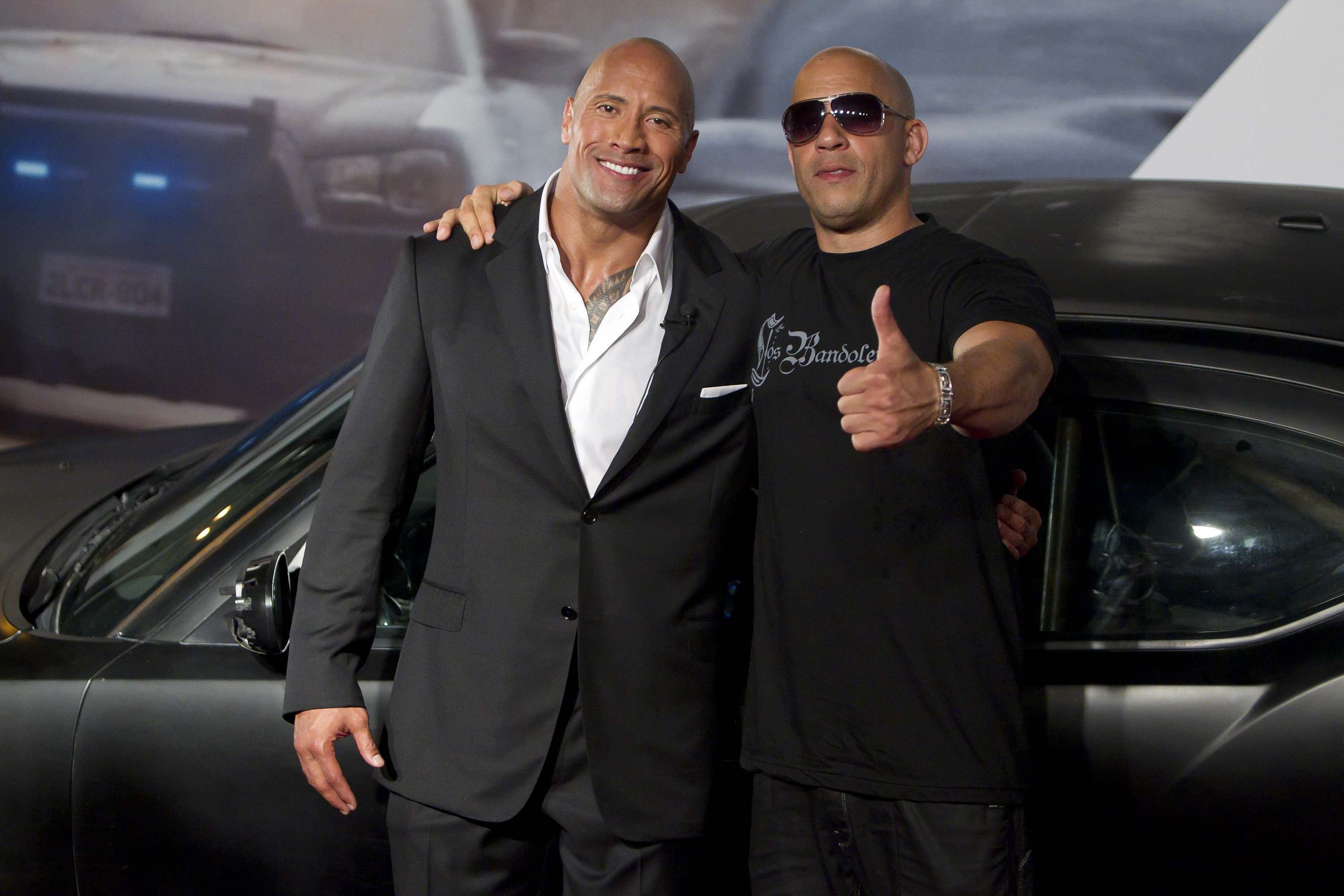 Dwayne Johnson (The Rock) and Vin Diesel (R) pose for photographers during the premiere of the movie "Fast and Furious 5" at Cinepolis Lagoon on April 15, 2011 in Rio de Janeiro, Brazil. (Buda Mendes/STF&mdash;Getty Images)