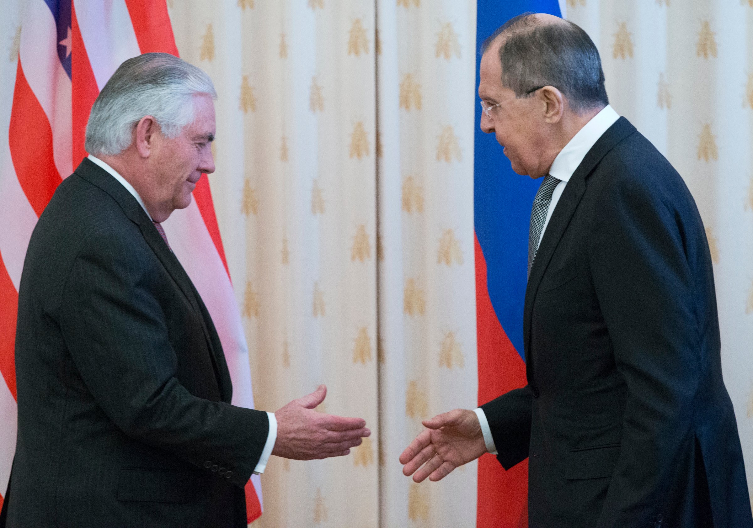Secretary of State Rex Tillerson, left, and Russian Foreign Minister Sergey Lavrov shake hands prior to their talks in Moscow, April 12, 2017.