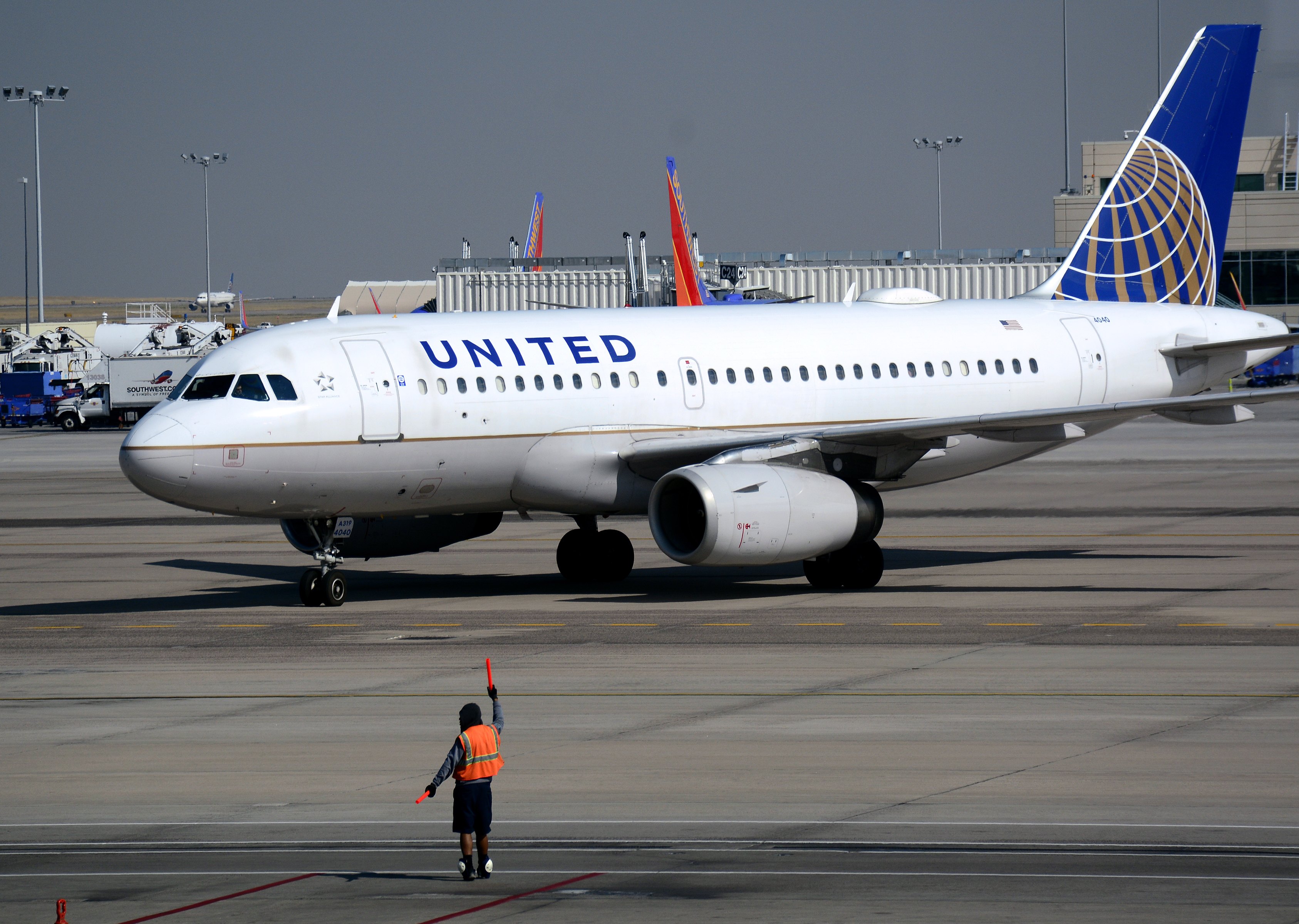 A United Airlines Airbus A319 passenger plane taxis toward a gate at Denver International Airport in Denver, Colo., on Aug. 25, 2016. (Robert Alexander—Getty Images)