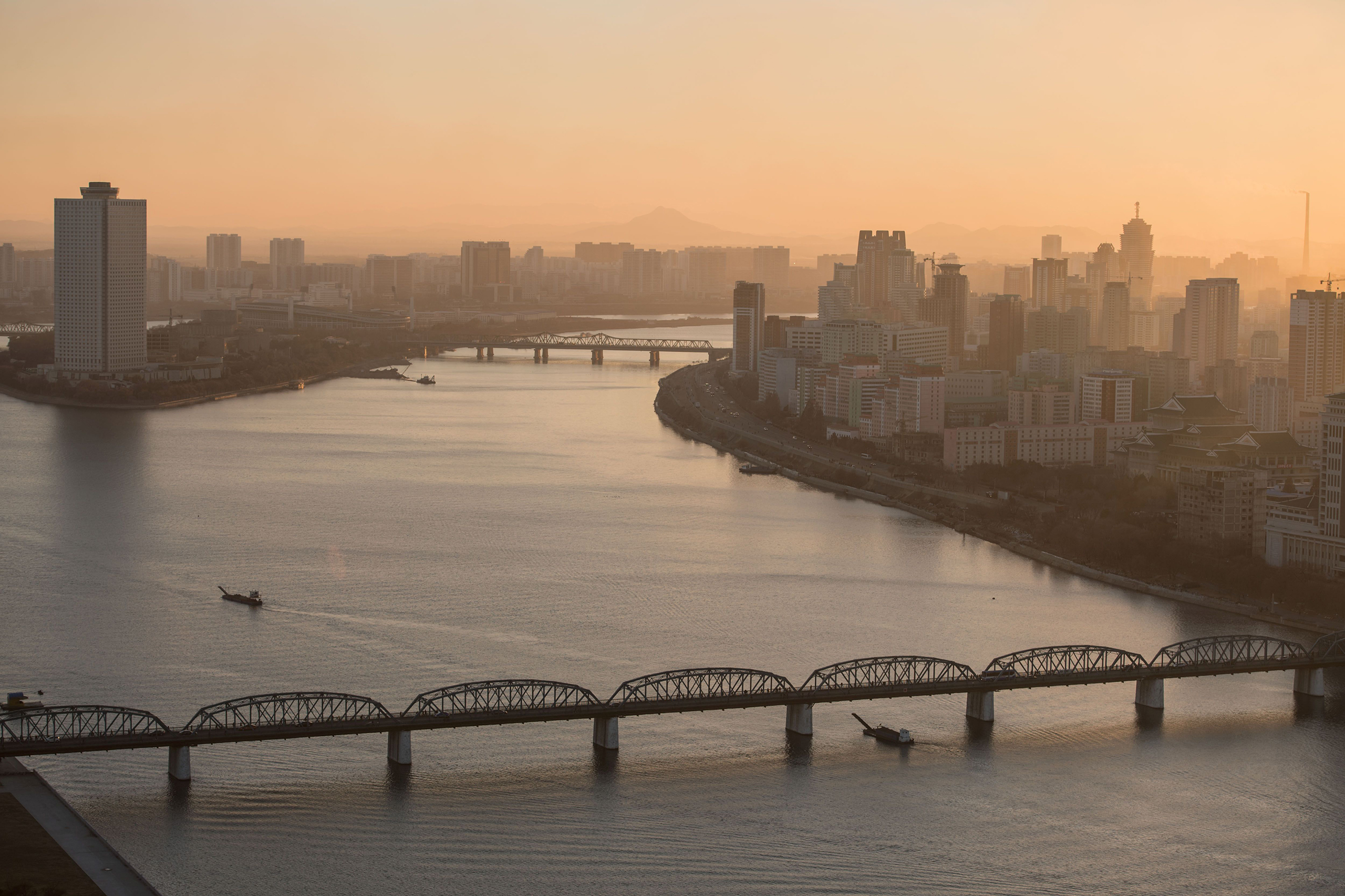 The Yanggakdo hotel, Taedong river and the Pyongyang city skyline on Nov. 28, 2016. (Ed Jones—AFP/Getty Images)