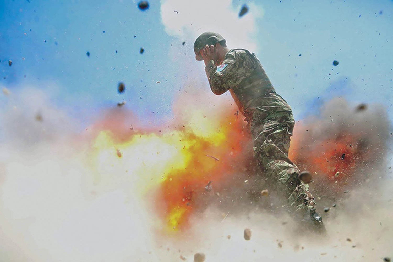 A mortar tube accidentally explodes during an Afghan National Army live-fire training exercise in Laghman Province, Afghanistan, on July 2, 2013. (Spc. Hilda Clayton—U.S. Army/EPA)