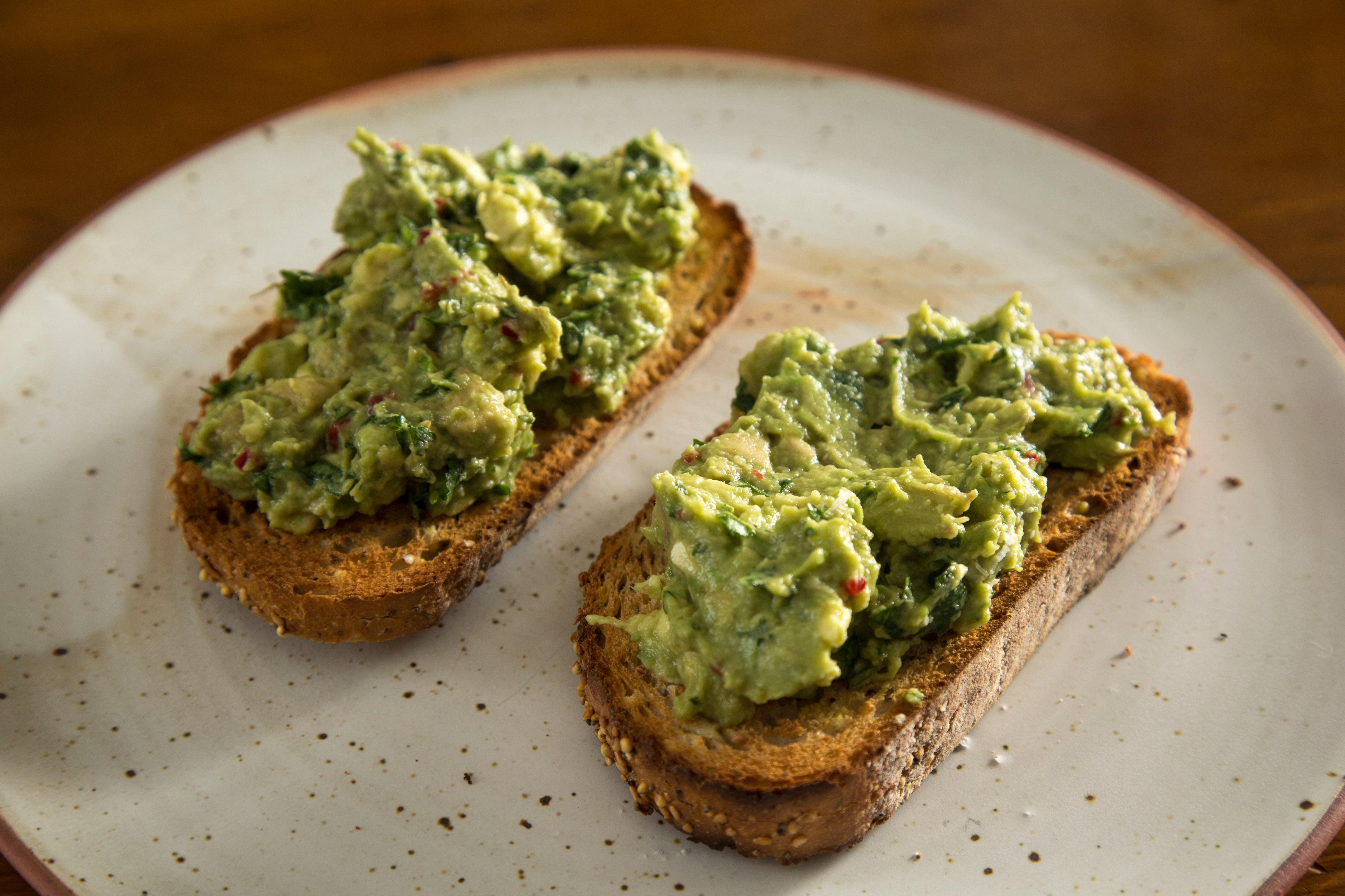 avocado toast with guacamole  on whole grain bread. A healthy breakfast or lunch. (Jon Lovette&mdash;Getty Images)