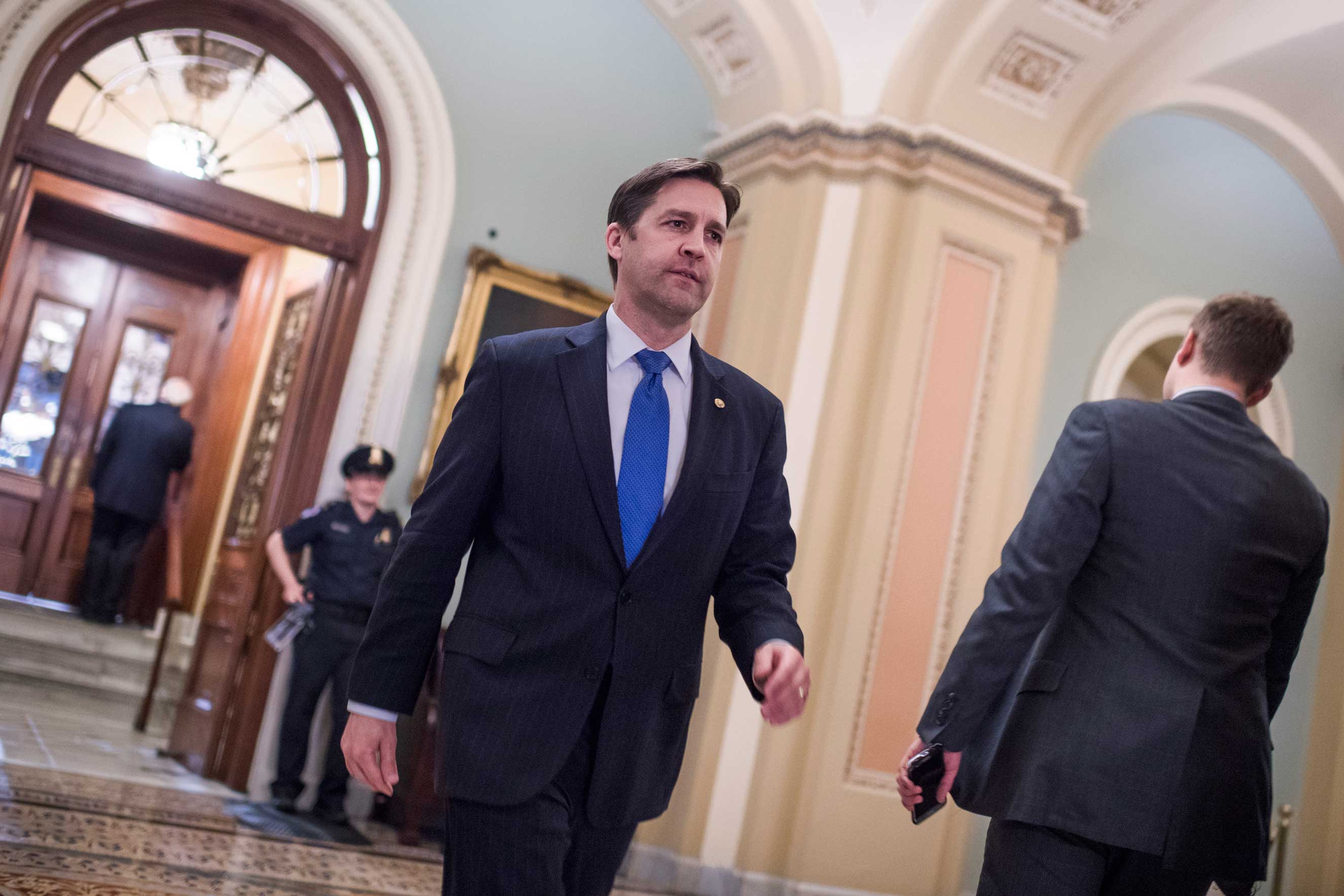 Sen. Ben Sasse, R-Neb., is seen in the Capitol's Ohio Clock Corridor after a vote in the Senate where they invoked the 