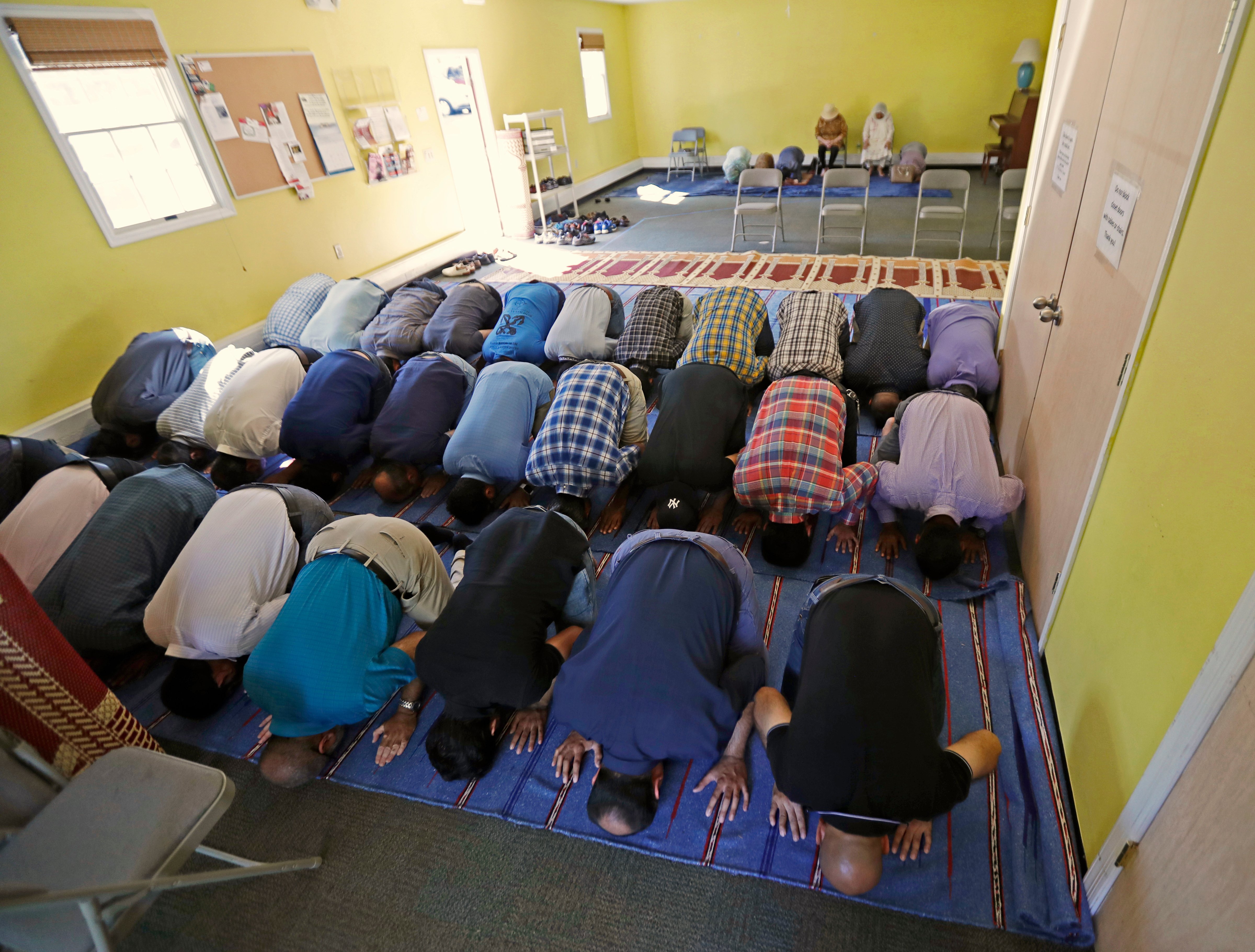 In this Sept. 23, 2016, file photo, Muslim worshippers pray during a service at the Bernards Township Community Center in Basking Ridge, N.J. (Julio Cortez—AP)