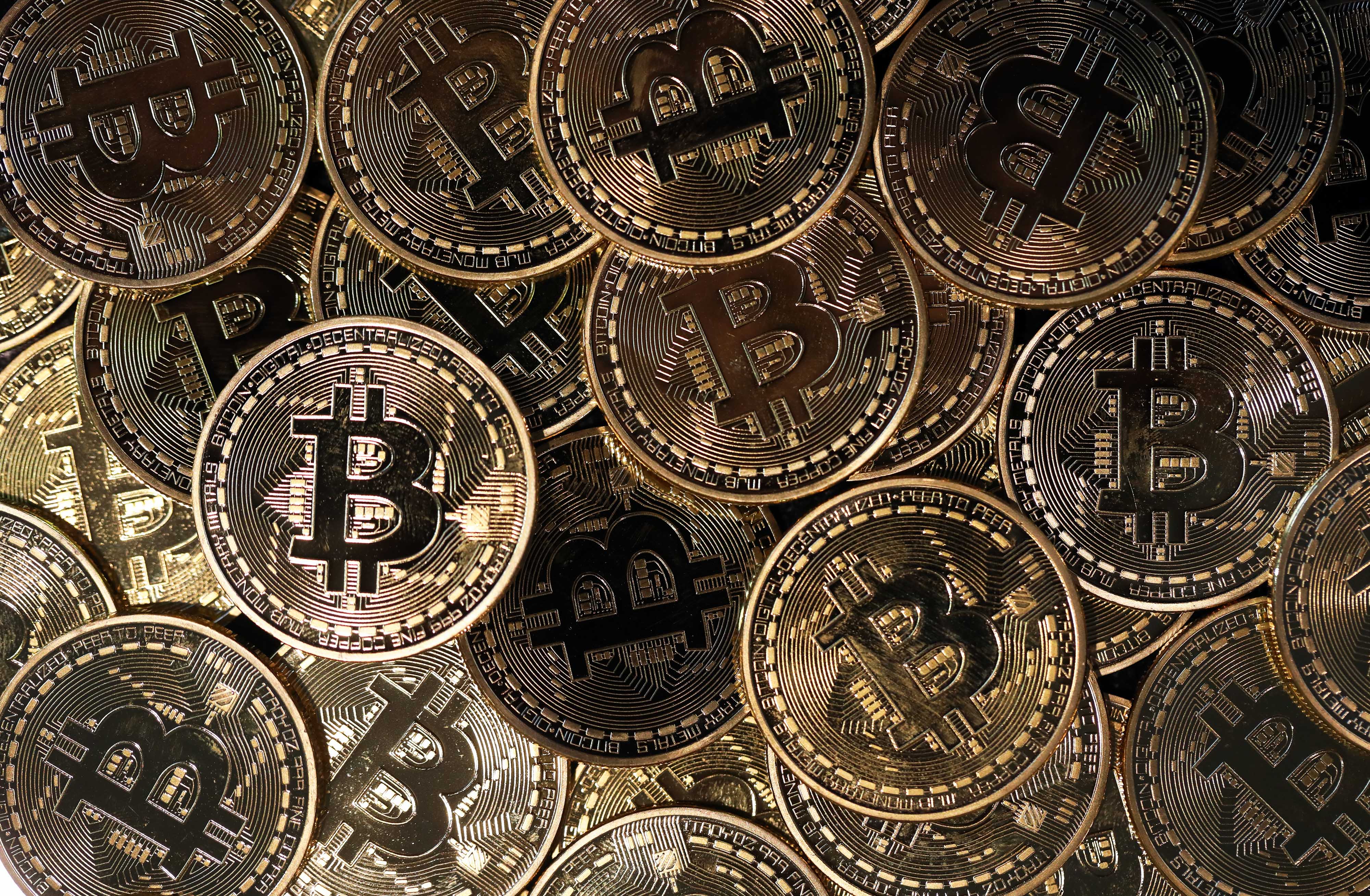 A collection of bitcoin tokens. (Bloomberg&mdash;Bloomberg via Getty Images)
