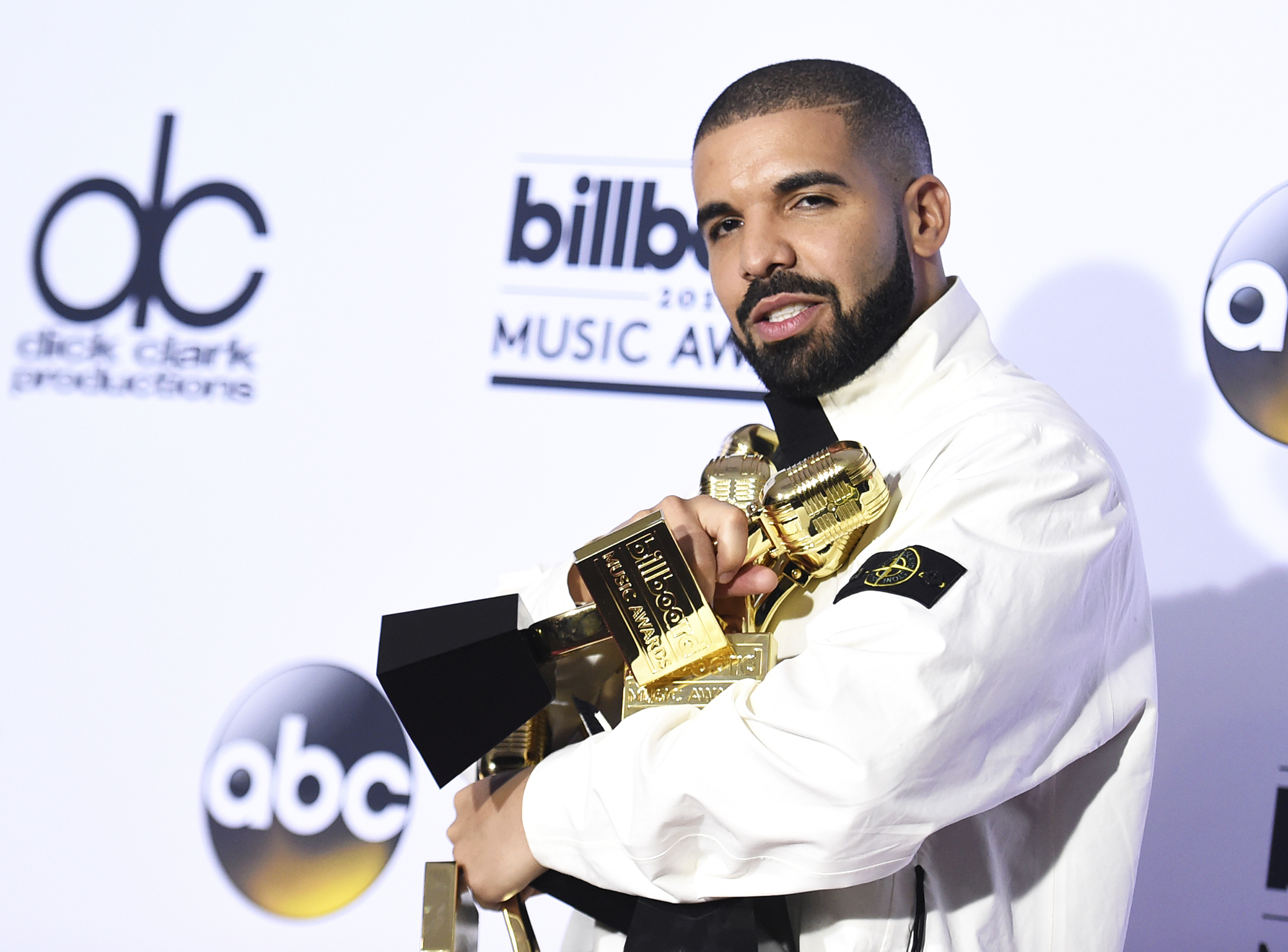Drake poses in the press room with his 13 awards at the Billboard Music Awards, on May 21, 2017 in Las Vegas. (Richard Shotwell—AP)