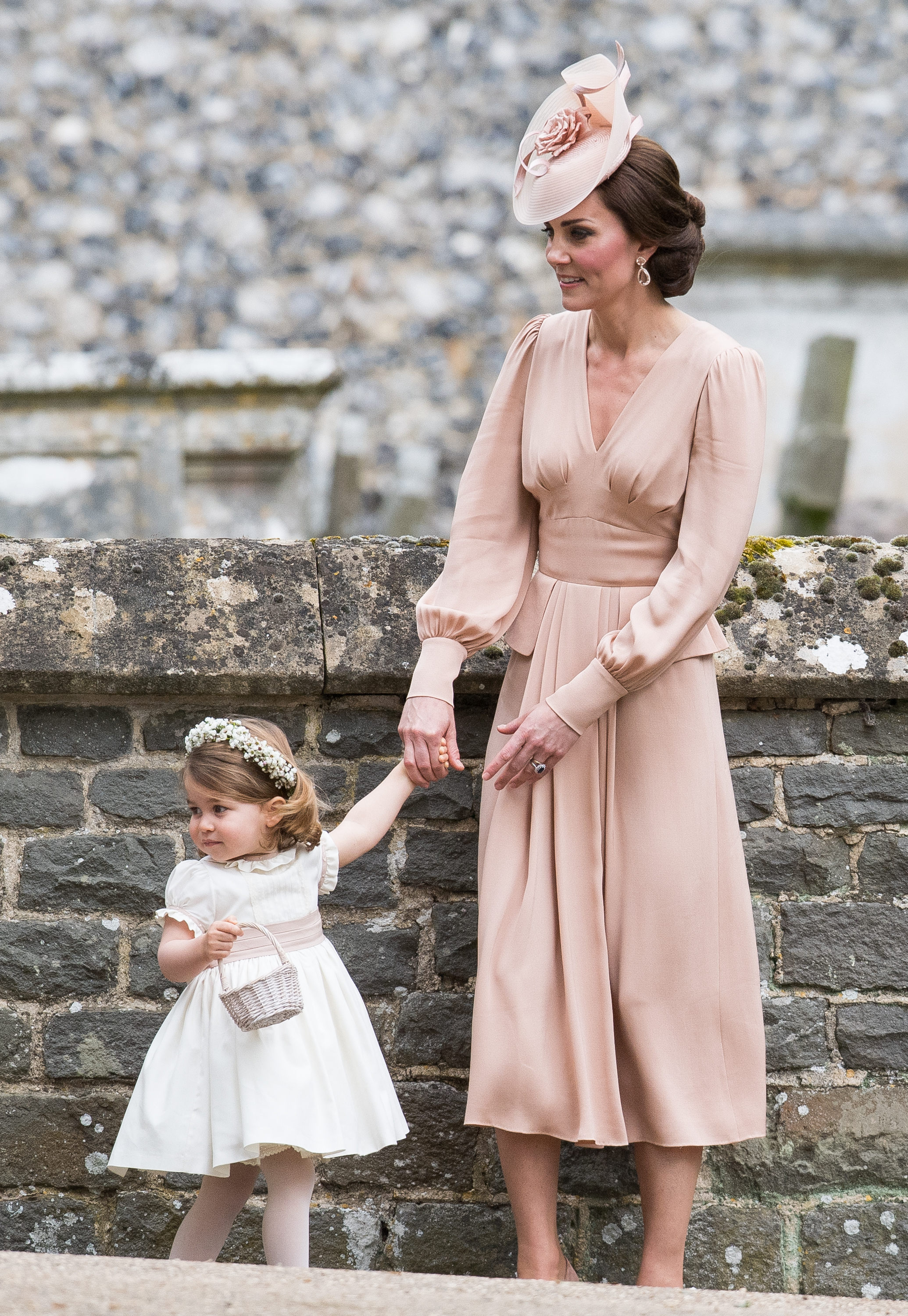Princess Charlotte of Cambridge, bridesmaid and Catherine, Duchess of Cambridge attend the wedding Of Pippa Middleton and James Matthews at St Mark's Church on May 20, 2017 in Englefield Green, England.