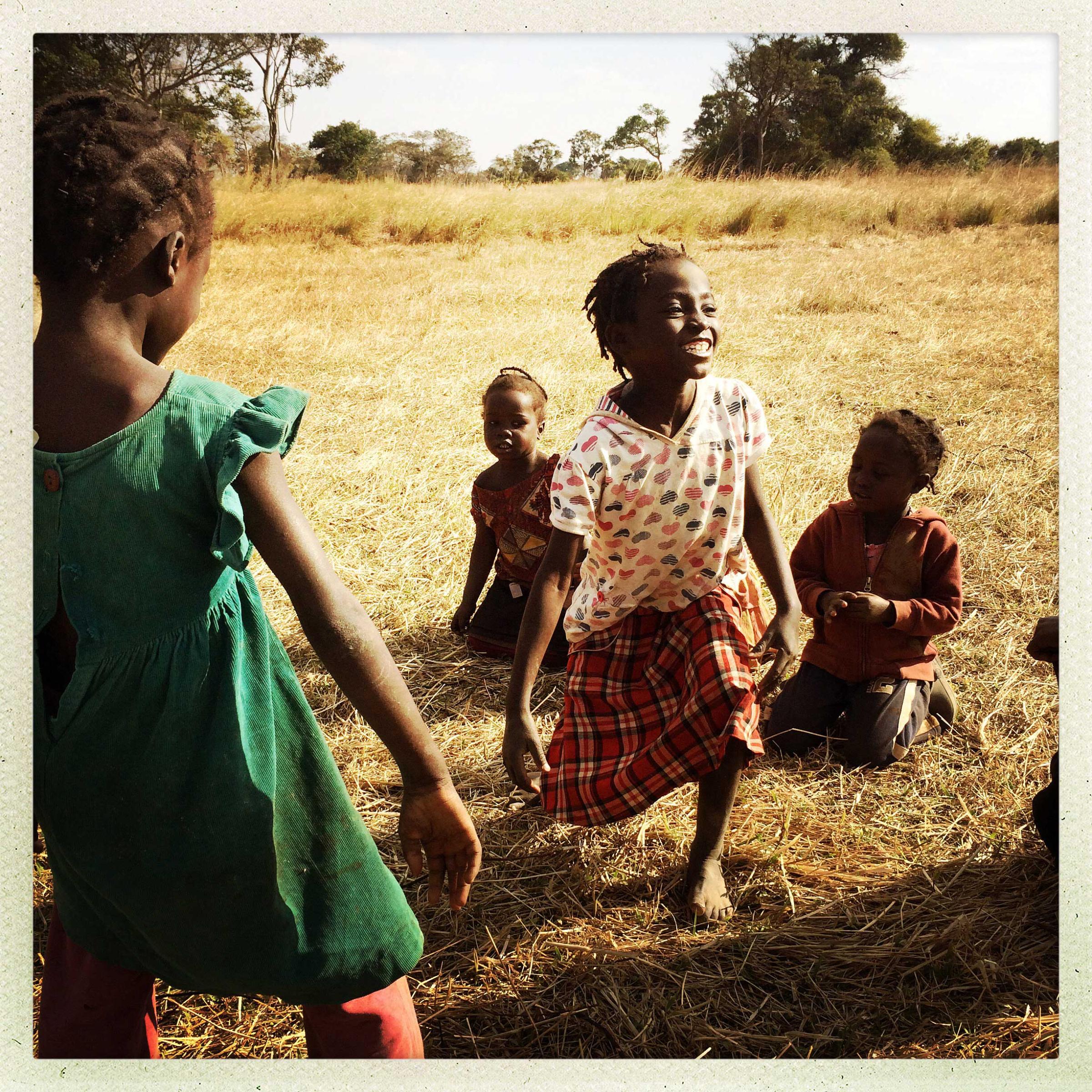 Girls play an afternoon dancing game in a village an hour outside Kabwe, Zambia. Many of the people here are subsistence farmers who grow tomatoes, cabbage, kale, and other food. @i_am_idil