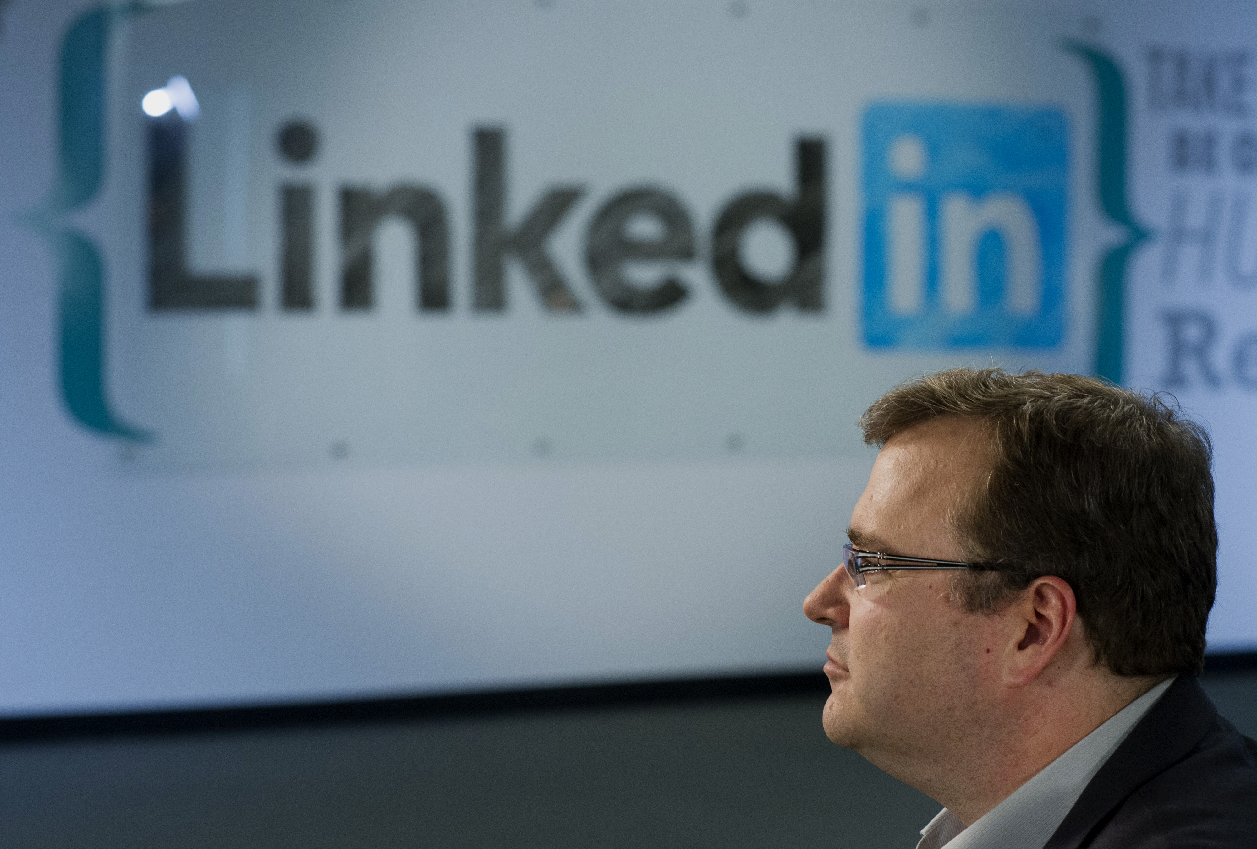 Reid Hoffman, chairman and co-founder of LinkedIn Corp., pauses during a Bloomberg Television interview in Sunnyvale, California, U.S., on Thursday, June 12, 2014. LinkedIn announced last week that users will soon have more design license over their profile pages, with the option of adding stock images or a custom backdrop - similar to what's already available on Facebook and Twitter. Photographer: David Paul Morris/Bloomberg via Getty Images (Bloomberg&mdash;Bloomberg via Getty Images)