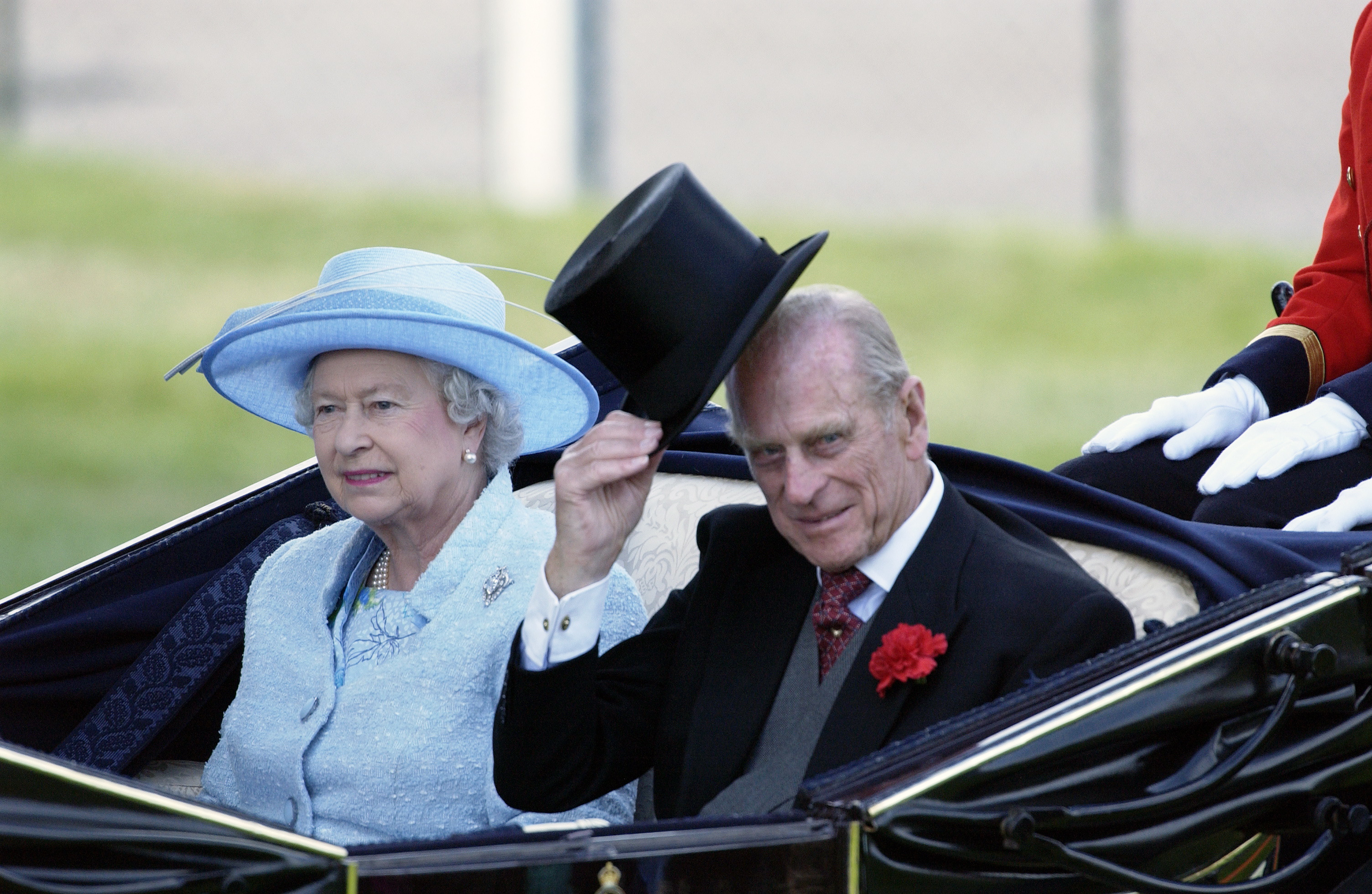 Queen Elizabeth and Prince Philip at the Royal Ascot Races on June 16, 2004. (Tim Graham—Getty Images)
